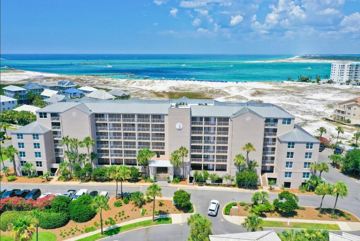 Rare opportunity to own  a spacious end unit with unmatched privacy and sweeping views at Magnolia House. As one of the largest units in this exclusive 66-condo building, this unit offers an upgraded layout, perfect for second home buyers or savvy investors. Located in Destin Pointe, you'll enjoy resort-style living with three pools (including a brand-new beachside infinity pool) , private beach access w/ 3000+ feet of beach frontage, shuffle board, tennis courts,  Whether you're dreaming of a personal retreat or a high-performing vacation rental, this end unit delivers space, privacy, and the best of coastal luxury. In today's market, deals like this don't last--schedule your showing now before it's gone!