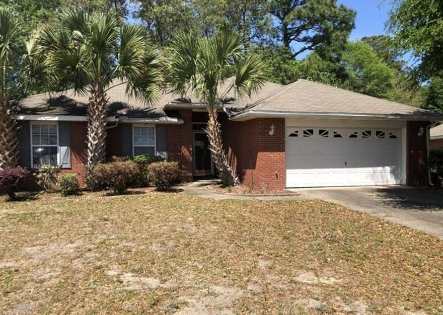 REO. All brick 3 Bd / 2 Ba home with raised ceilings, wood laminate & tile floors as well as a Florida Room overlooking the backyard. The living room offers gas fireplace & raised ceilings. The kitchen features granite counter tops & an island with plenty of storage space. Great location in Niceville... close to shopping, dining & schools. May qualify for seller (vendee) financing.