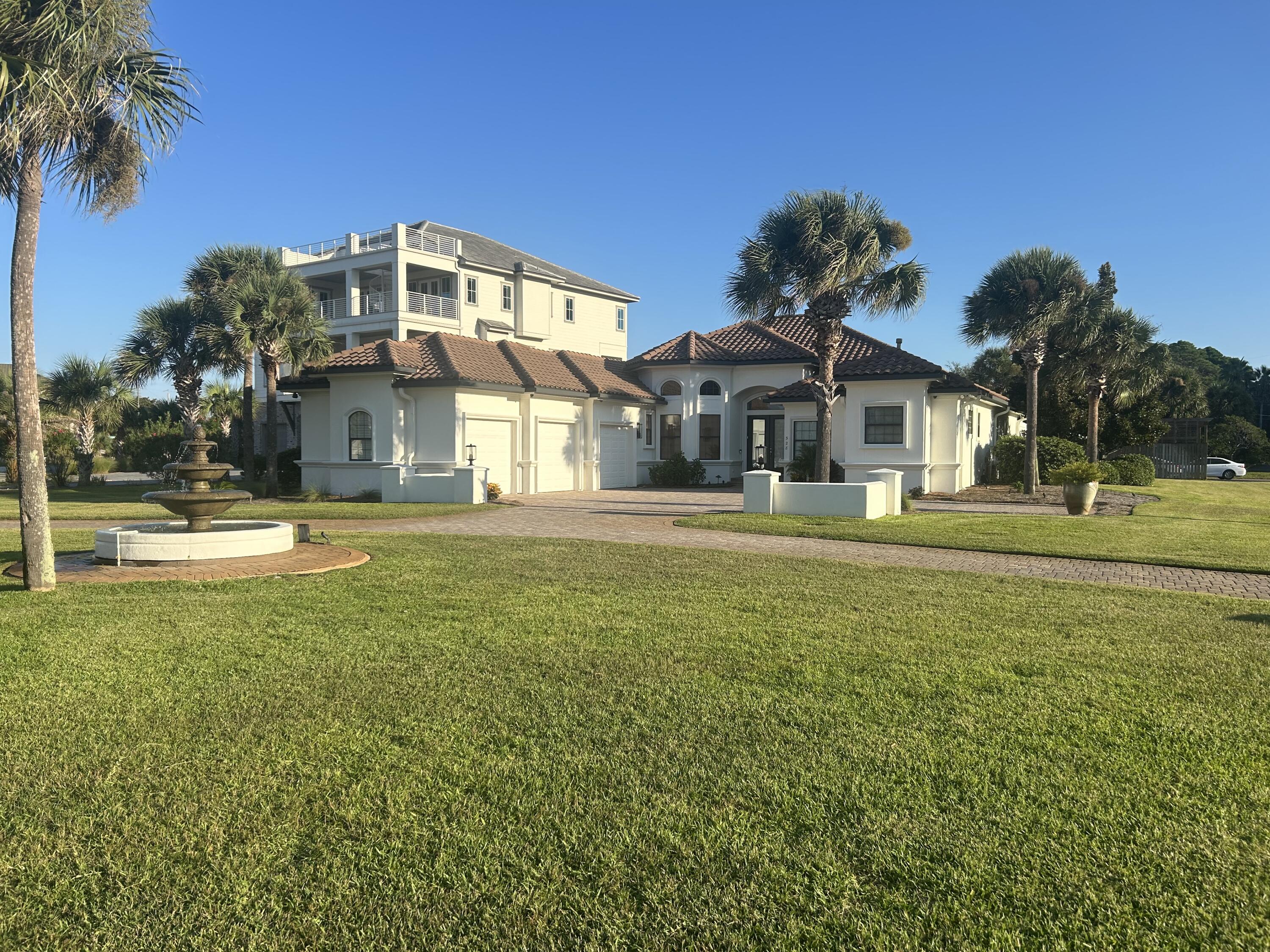 Presenting a One-Level Mediterranean Masterpiece in Gulf Pines, and only Steps away from the Gulf of America!This is a exquisite custom built estate in the heart of Gulf Pines, where luxury meets beach lifestyle. This single-story 4 bedrooms plus a bunk room/office, 3 full baths, and a breathtaking open floor plan with soaring ceilings that blend elegance with coastal charm.Enjoy indoor-outdoor living at its finest: dine or entertain under the expansive lanai overlooking your private enclosed heated gunite pool & hot tub, or cozy up beside one of three fireplaces. The gourmet kitchen is outfitted with dual wine coolers, premium appliances, and exquisite finishes. Every detail has been considered: hardwood & tile floors, tray ceilings, crown molding, and generous walk-in closet in the primary suite, which also includes a luxurious bath with separate shower.
Garage enthusiasts will appreciate the oversized 3-car attached garage. Outside, the immaculate 0.54-acre lot offers lush landscaping with an sprinkler/lawn systems already in place.
Residents of Gulf Pines enjoy access to the private neighborhood beach (Taj Mahal). Furnishings are included; this home is truly turnkey.
Don't miss this rare opportunity to live where elegance, privacy, and coastal beauty converge.