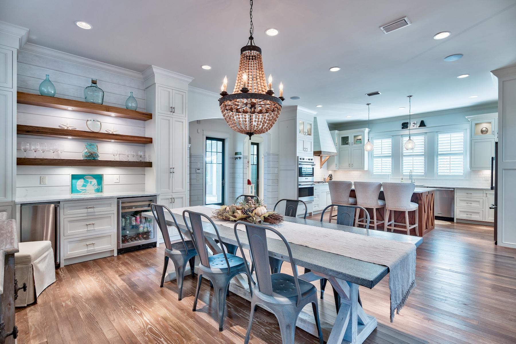 Check off all of the must-haves for buyers with this pristine home built on an oversized corner lot that has never been rented. The list includes pool, garage, outdoor entertaining space, abundant parking, first floor junior master, mudroom and powder room connected to enclosed outdoor shower. The family room, kitchen and dining room flow beautifully and expand to screened lounging and dining porches. A golf cart is included for trips to one of the most beautiful beaches on 30A. A whole home generator, second floor living area, a private bath for each of the four bedrooms and beautiful furnishings make this turn-key home effortless for its new owners to enjoy immediately.
