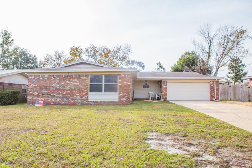 Spacious house located only few minutes to Hulburt, beaches and shopping area. This home features two large living areas and an enclosed Florida Room with a pool table that's included with the sale! The kitchen flows straight into the dining area - a floor plan ideal for entertaining. There are three bedrooms and the master features a full bath with shower.Additional features include: New HVAC system (2016) and oversized garage.