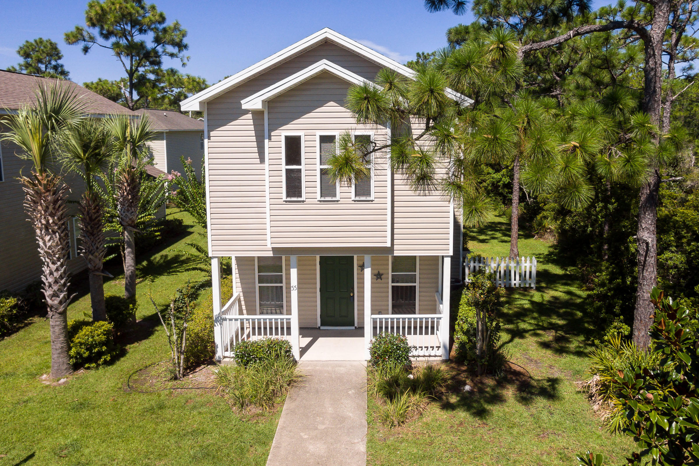 Cute Florida Cottage and under $200,000, quite area and very well maintain home. Perfect for small family or investment purpose.Living room, Kitchen & bathrooms tiled and bedrooms carpet. Home is located on the end of road so no neighbors next door. Minutes to the Beach. Great community pool & club house & dog run. HOA takes care of your yard, trash & maintenance of common areas & fences. Come view