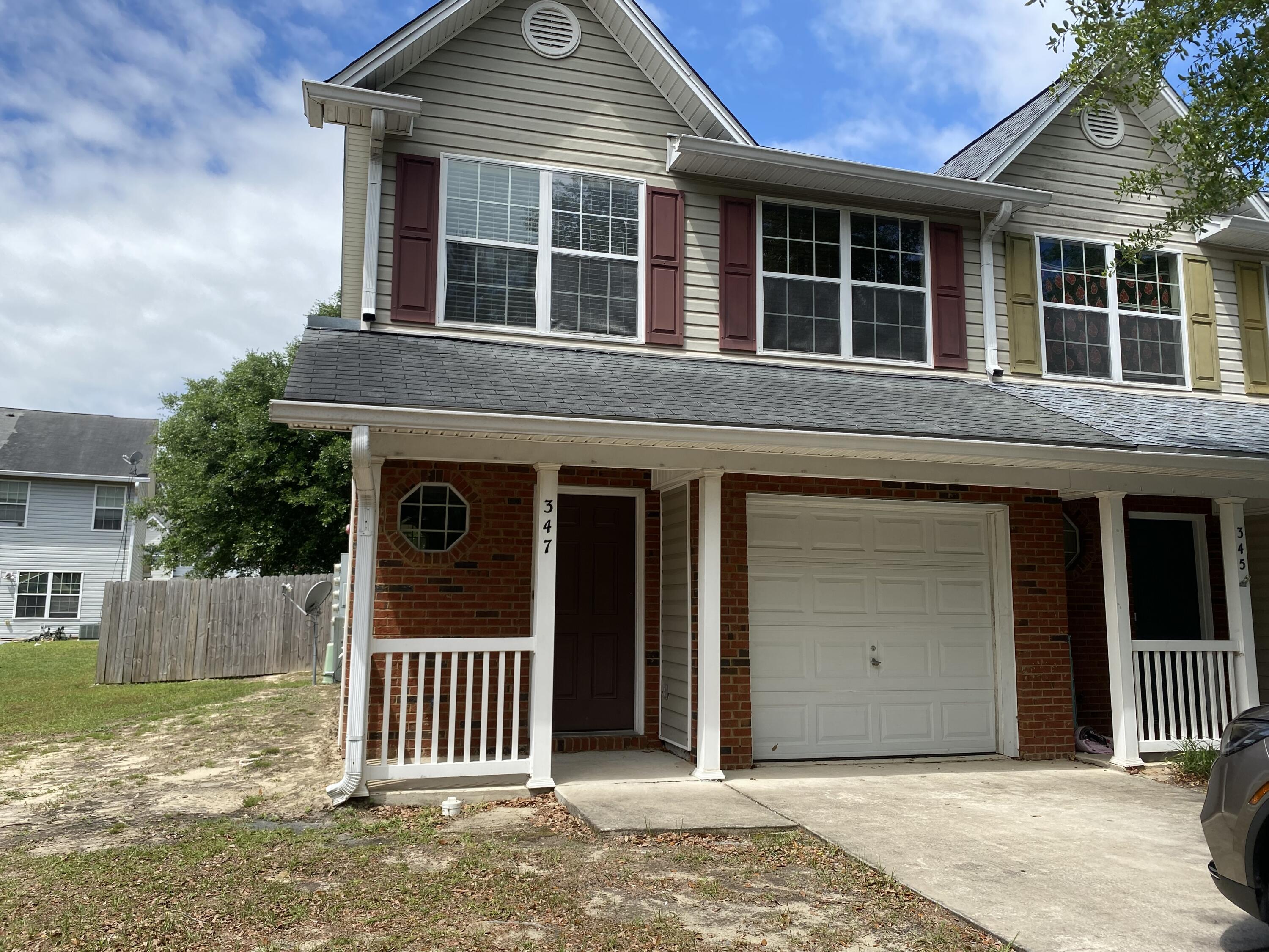 Corner unit townhouse; bedrooms upstairs; privacy fenced backyard; 1 car garage;