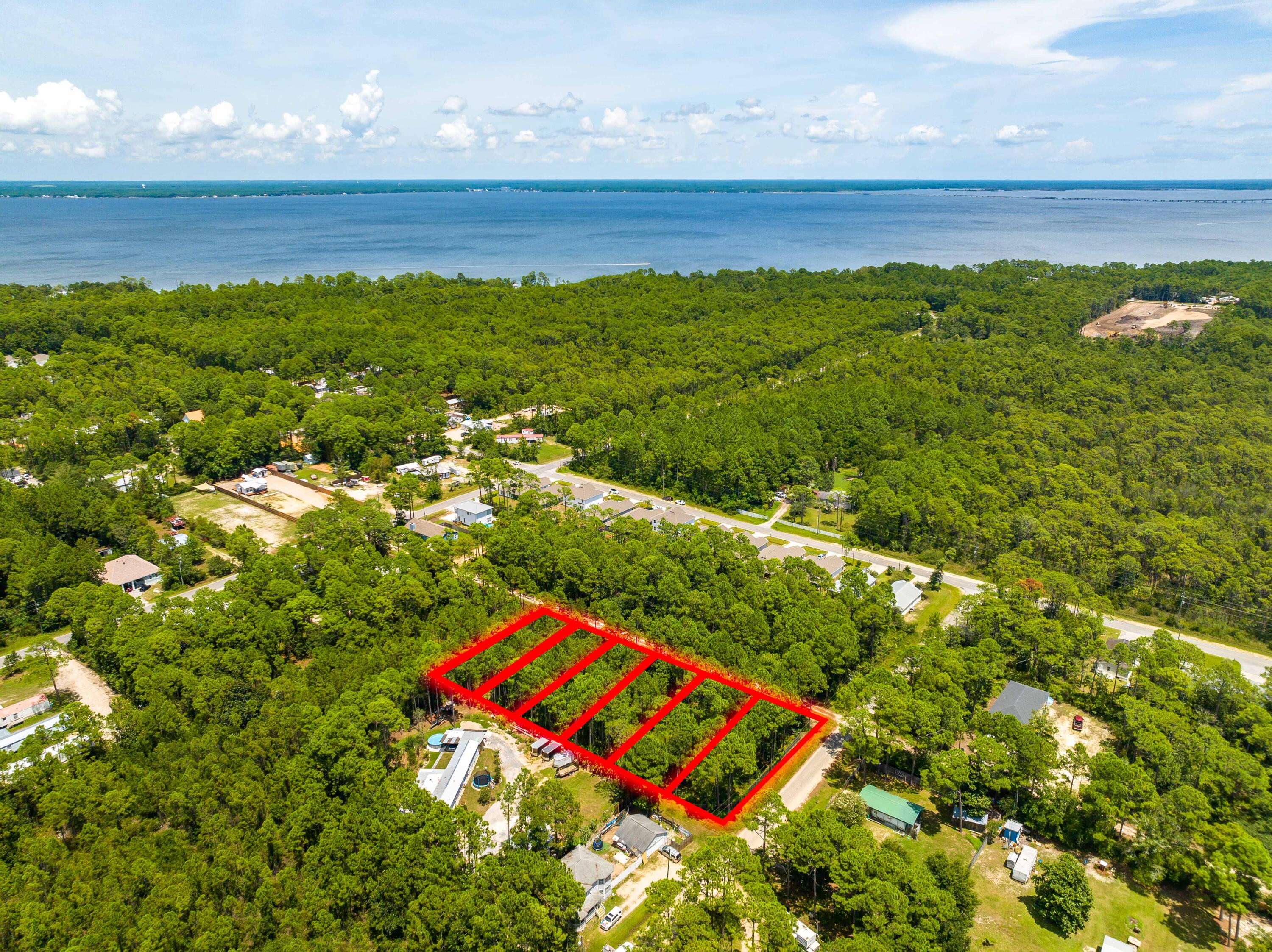 Attention Builders and Developers! An exceptional opportunity awaits you to bring your vision to life in the highly desirable North Santa Rosa Beach area. These six vacant lots (Lots 7, 8, 9, 10, 11, 12) are awaiting transformation, with Lots 11 and 12 already cleared and ready for your creative touch. All lots boast dimensions of 50x125, providing the perfect canvas for your next residential project.With ample space to work with, the possibilities are boundless when it comes to designing and constructing your ideal homes. Nestled in a tranquil corner of Santa Rosa Beach, these lots offer a serene retreat while remaining just a short drive away from the vibrancy and amenities of the 30A area. From the breathtaking white sand beaches to the world-class golf courses and everything in in between, your future homeowners will have access to the very best that Santa Rosa Beach has to offer.
So why wait? Seize this rare opportunity to craft something truly extraordinary in one of the fastest-growing areas along the Gulf Coast. Reach out to us today to discover more about these prime development lots and embark on planning your next remarkable project!
