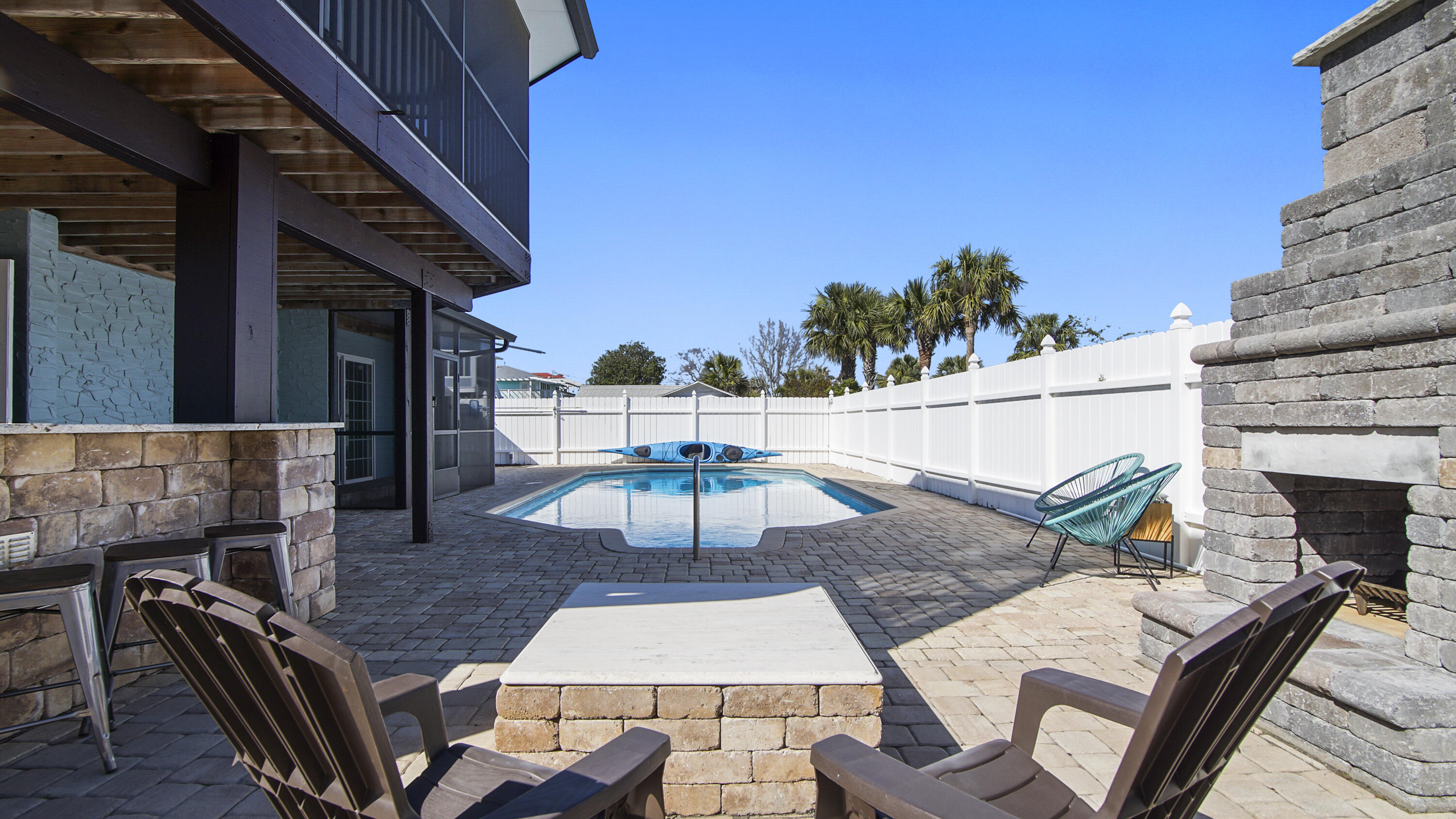 PRICE ADJUSTMENT! Quintessential Florida 3 BR/3 BA Beach House with Private Pool and Outdoor Kitchen on Okaloosa Island! Quiet, unassuming beach casual; everything you need is here for the perfect second-home beach escape or primary residence... The 2-story design provides both upper and lower decks, an elevated living area to enjoy the views, and multiple recreational spaces throughout to make the most of the outdoors. The showstopping Backyard Oasis is a coastal dream paradise - Private Inground Pool with Brick Paver Pool Deck, Outdoor Kitchen, Outdoor Fireplace Feature, and Screened Lanai Decks on both levels! For peace of mind, there is a new Roof in 2024, & updated HVAC, Water Heater, etc. Life at the beach is just better; schedule your showing today!