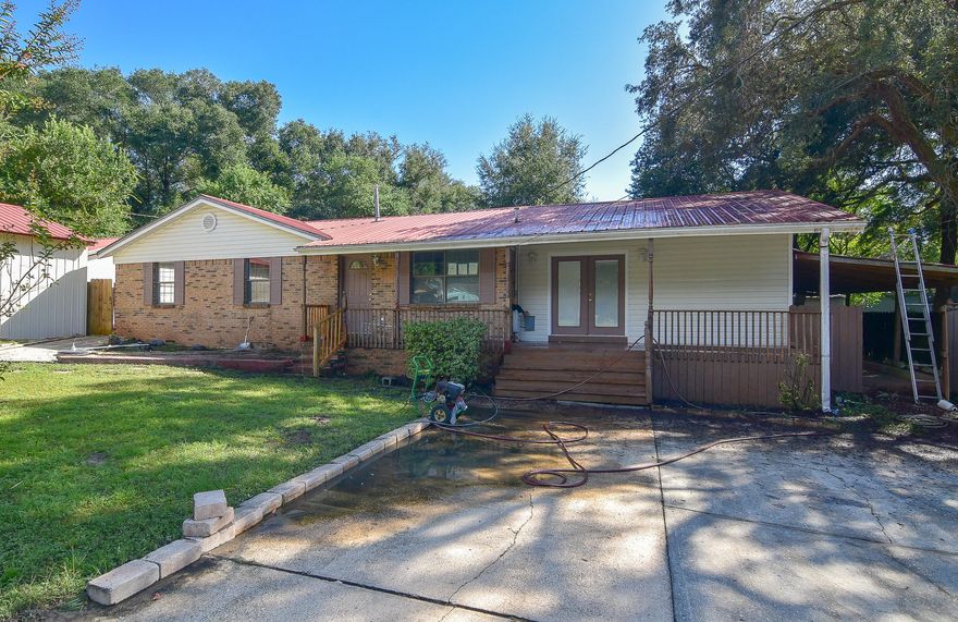 This short sale property has tons of potential for the right buyer. There is plenty of space for your many vehicles, your boat, RV or work shop! The home features 3 bedrooms and 2.5 bathrooms. The kitchen is spacious with plenty of cabinet space and is open to the large dining room. The family room is huge and has cathedral ceilings with a fireplace surrounded in stone accents. In the back of the home, there is a separate entrance to an additional living space which includes a private bathroom, that would work well for a roommate situation or a mother in law suite. The back yard features an above ground pool with a deck surround and plenty of areas to entertain. With a little work the back patio could be your dream oasis! Don't miss out on this opportunity.