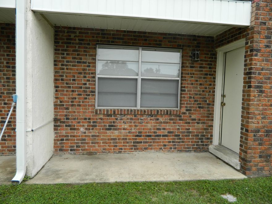 This Ground floor front unit is Move in READY! The seller added Brand New flooring throughout, completely painted, new blinds, new screens and had the unit professionally cleaned. The open floor plan and split bedrooms are a few of the features you will appreciate. Everyone will enjoy their own walk in bedroom closets too! Complex features a community pool and laundry facility. Water, trash, sewer, as well as exterior maintenance and insurance are covered in the monthly association dues.Don't want to drive? That's okay, the bus route is just outside the complex. The complex is minutes from shopping, schools, bases and our famous Gulf Coast White Sandy Beaches and Emerald Green water!What are you waiting for? Your new condo is ready for you!!!