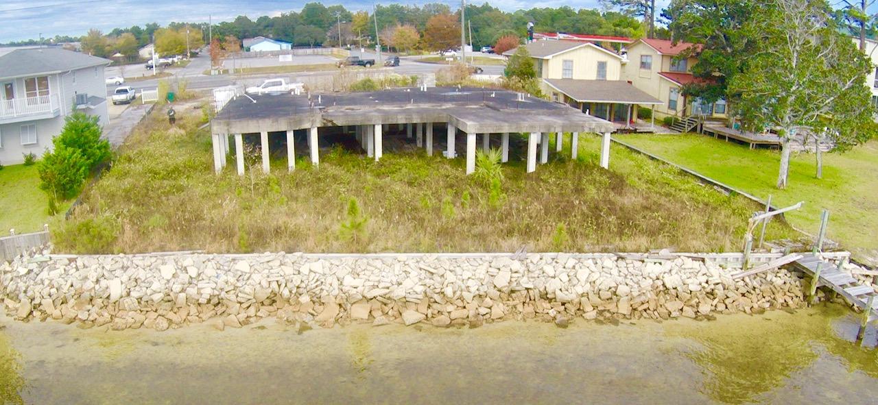 Great location. Beautiful sound front lot! Just over 1 mile to the front gate of Hurlburt Field. Comes with full set of plans for 4255 sq ft house.Seller has over $180,000 invested in seawall, concrete pilings, and slab. Having this already in place will greatly reduce your buildings costs.