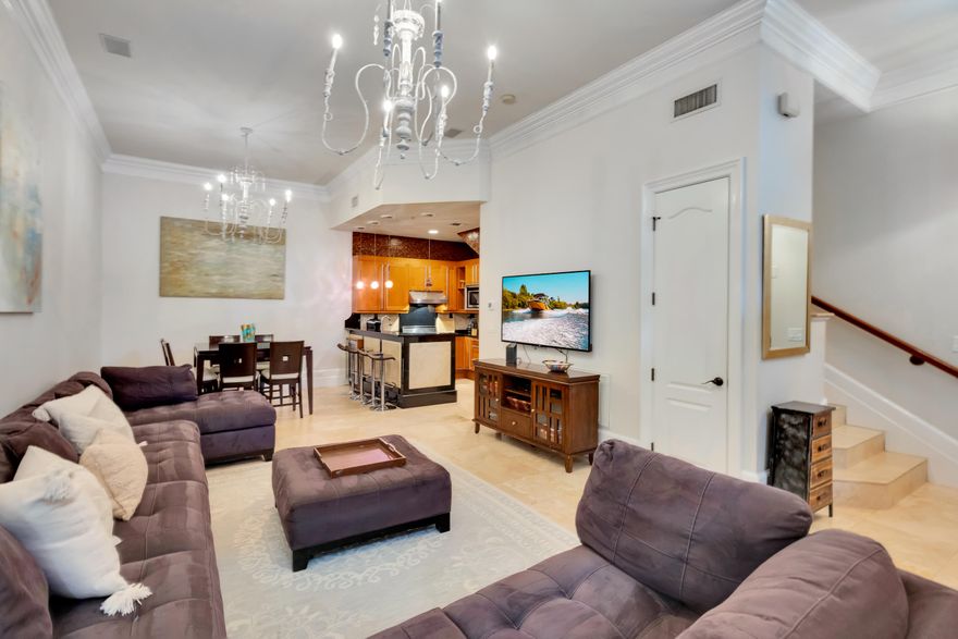 This 3-story townhome in the gated Le Jardin community, located in the heart of Baytowne Wharf, blends luxury with convenience. Le Jardin's New Orleans-inspired design features cobblestone courtyards, fountains, and manicured gardens, all just steps from top shopping, dining, and entertainment. Inside, the spacious layout includes a first-floor living area, a chef's kitchen with Viking and SubZero appliances, and a separate dining area. Two master suites, each with a private balcony and en-suite bath, offer added comfort. The home boasts 12' ceilings, wood and travertine flooring throughout, and a private ground-level patio for relaxing or entertaining. Le Jardin's resort-style amenities include a terrace pool, spas, fitness center, grilling areas, and fireplaces. As an introduction to the Sandestin lifestyle, we invite our new owners to explore amenities that make Sandestin special. The listing brokerage and seller(s) are presenting the buyer(s) of this property with (2) 90-minute rounds of Tennis court time, a golf foursome at one of our three championship courses, and a round of golf for up to four (4) players at the unrivaled Burnt Pine Golf Club.

Sandestin Golf and Beach Resort features more than seven miles of beaches and pristine bay front, four championship golf courses, 15 world-class tennis courts, a 226-slip marina, a fitness center, spa and celebrity chef dining. Shop, dine and play at the charming pedestrian village, The Village of Baytowne Wharf and more. Inside the gates of the resort, residents enjoy a balanced lifestyle of high-class living, spanning the 2,400 acres from the beach to the bay. Everything within the gates of the resort is accessible by golf cart or bicycle. The entire resort is interconnected by miles of pedestrian, bike and golf cart paths that weave through groves of live oaks, meandering past natural lagoons, fountains, man-made lakes, and meticulously landscaped fairways.
