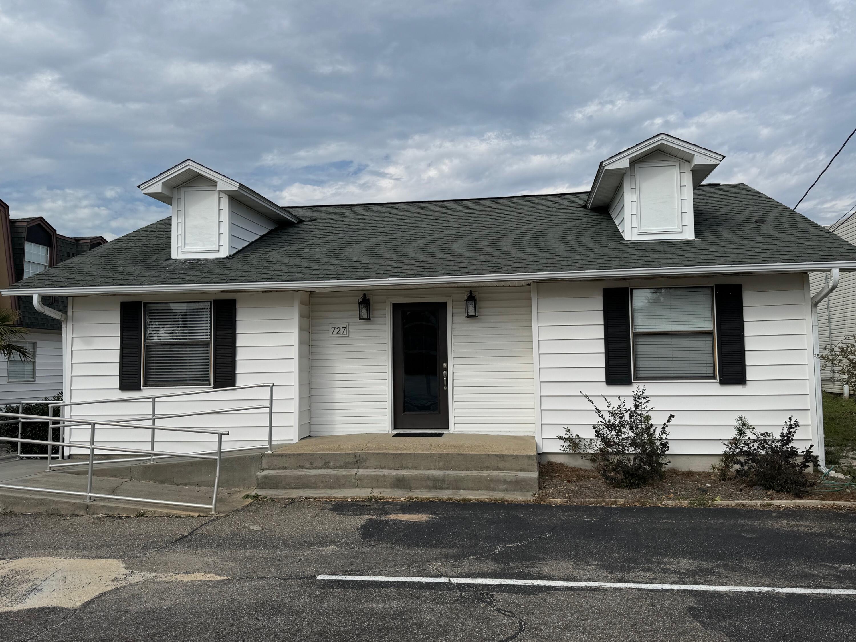 This spacious single-story office building is conveniently accessed directly on Harbor Boulevard and has parking in front and rear, each with an office entrance. The front entrance has steps and an ADA access ramp. 6 private offices plus a conference/training room can all be accessed via the central reception area and hallway. Two public restrooms are in the front along with a kitchenette. A third restroom serves the conference room in the back half of the building
