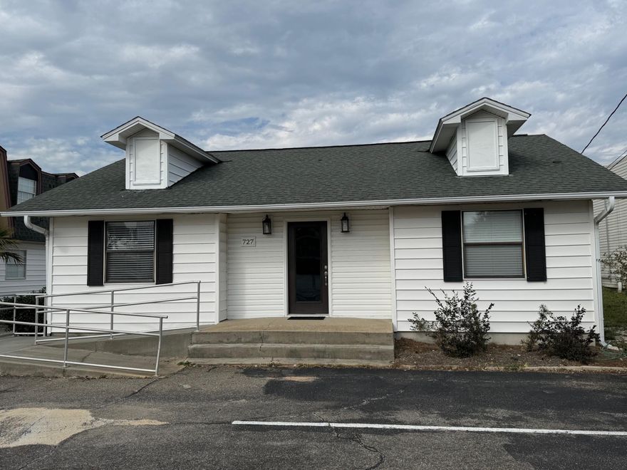 This spacious single-story office building is conveniently accessed directly on Harbor Boulevard and has parking in front and rear, each with an office entrance.  The front entrance has steps and an ADA access ramp.  6 private offices plus a conference/training room can all be accessed via the central reception area and hallway.  Two public restrooms are in the front along with a kitchenette. A third restroom serves the conference room in the back half of the building