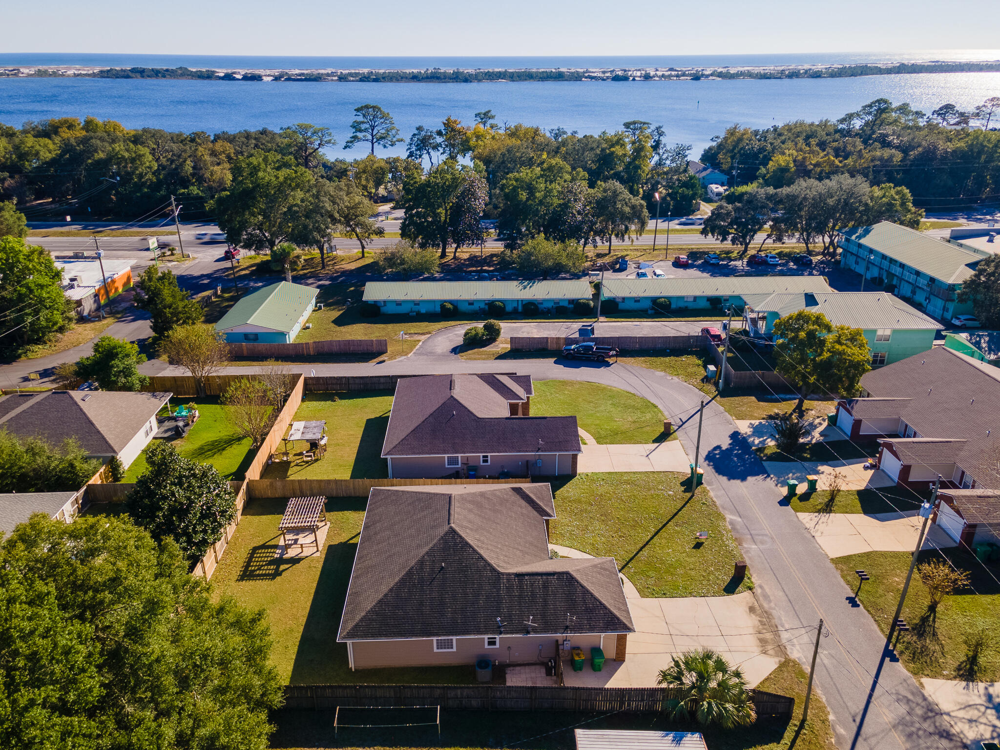 Nestled in the heart of Emerald Coast, a charming slice of paradise that offers the perfect blend of comfort, in this highly sought-after neighborhood in Mary Esther, and is only 1.5 MILES FROM HURLBURT FIELD AIR FORCE BASE. This ''move in'' ready delightful 3-bedroom, 2 bathroom family home is more than bricks and mortar; it's a canvas for cherished memories. As you step through the front door, you're greeted by an abundance of natural light that dances throughout the open living space. The warm, neutral tones of the walls provide a perfect backdrop. Spacious kitchen with granite counters and real wood cabinets. Large primary bedroom with raised ceiling and ensuite bathroom. Huge backyard with plenty room for a pool or your dream oasis! Contact me or your favorite realtor to view today.