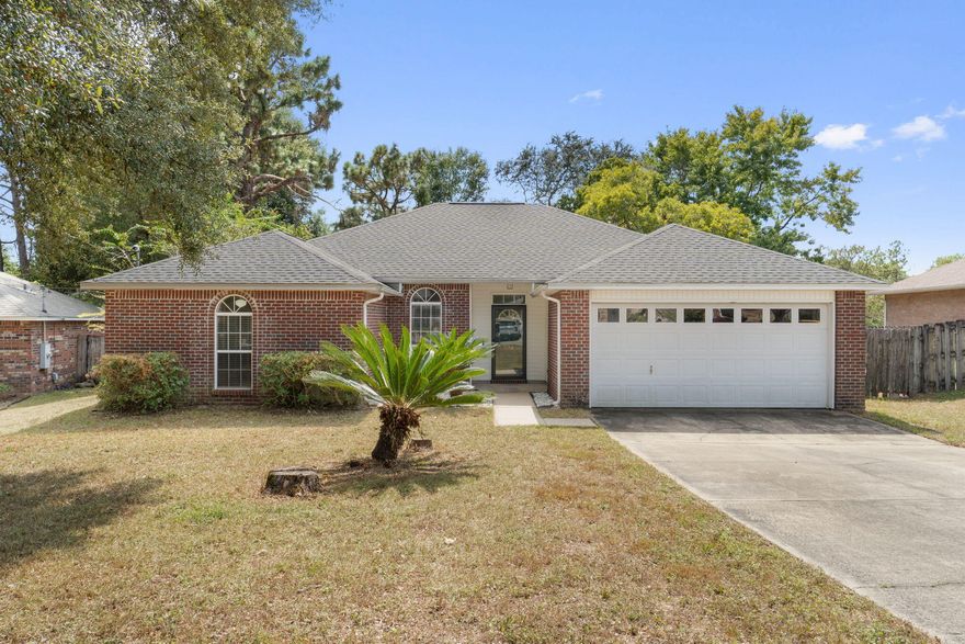 Welcome to 394 Riverchase Blvd!This 3-bedroom, 2-bath home offers a 2022 roof and a layout designed for easy everyday living. The split-bedroom floor plan features a vaulted ceiling in the living room and a fireplace for added charm.In the kitchen, you'll find granite countertops, freshly painted cabinetry, and a full set of appliances. The home also has fresh paint throughout, updated bathroom vanities and mirrors, and durable LVP and tile flooring. The primary suite stands out with a large walk-in closet and a spacious bath featuring dual vanities.Step outside to enjoy the screened-in back porch, fenced backyard, and storage shed. Blinds are already installed, and the washer, dryer, and an additional refrigerator in the garage are included for extra convenience.Move-in ready and well cared for, this home is ready for its next chapter.