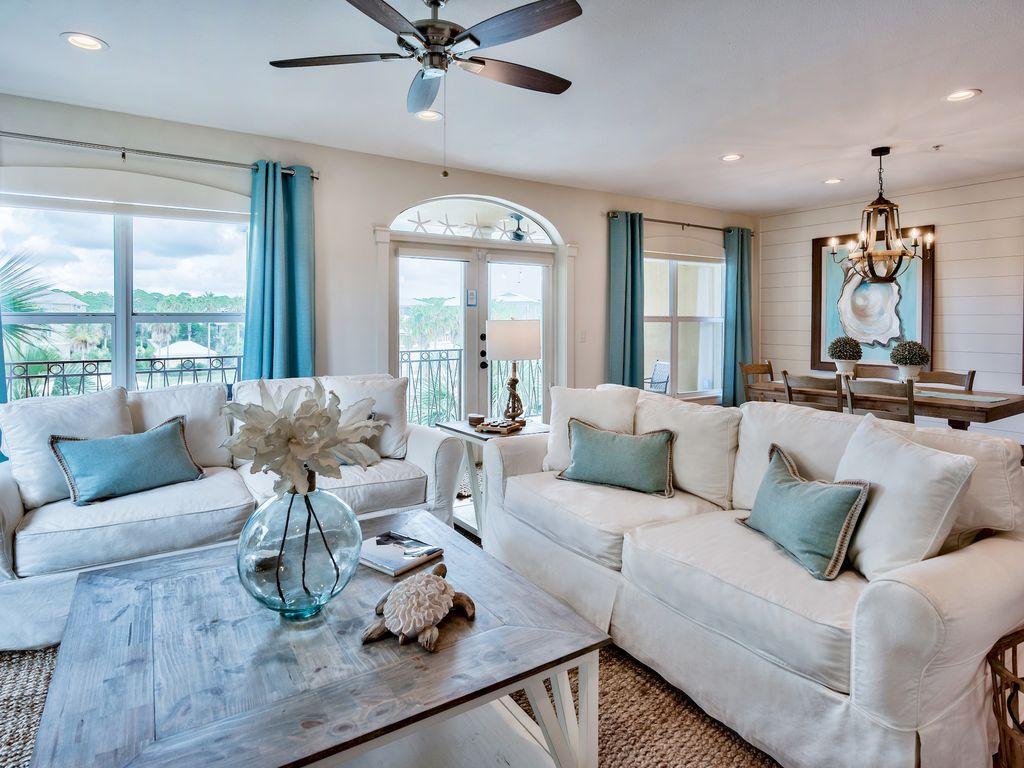 Villas at Seacrest Beach B-301 is a beautifully updated 3 bedroom 3 bathroom 1,944 sqft condo ideally located steps from the beach and within a short walk of Rosemary and Alys Beach along with the shops and restaurants found in Seacrest. B-301 overlooks the 12,000 sqft lagoon style community pool and is completely turnkey. The condo has been professionally overhauled from the new paint to all new furniture and decor. The kitchen has been totally recreated and now includes an over sized dine in island, custom pantry and separate wet bar, distressed cabinets, new granite counters and stainless appliances. A new ship lap accent wall was added to the dining area along with new light and plumbing fixtures throughout the condo. This condo feels fresh and comfortably sleeps the entire family.