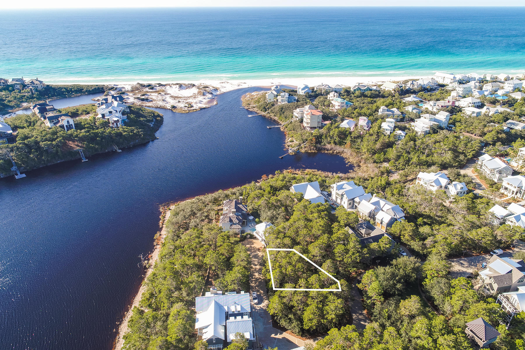 Exceptional building site located near the southernmost point of Draper Lake. This oversized .15 acre lot is one of the largest in the neighborhood surrounded by community preserve and offering potential for both gulf and lake views. Draper Lake owners enjoy exclusive access to all of the world class neighborhood amenities including convenient proximity to community docks, multiple pools, nature trails, shared golf carts, observation tower and close proximity to beach access.