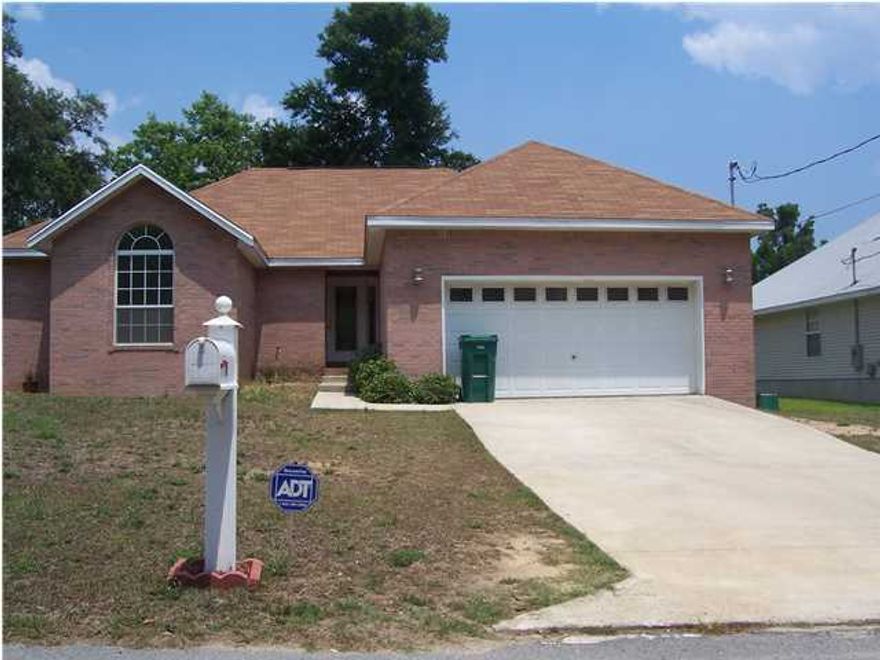 All Brick home, in the Heart of Niceville, 3 Bedrooms, 2 baths, with 2 car garage, Wood burning fireplace, coffered ceiling. Kitchen appliances include refrigerator (non-warranted), dishwasher, stove/oven. Eat in area off the kitchen and a Great Room. Washer and dryer hook ups in the indoor laundry room. Owner will consider a pet that is spayed/neutered and fully housebroken with a non refundable pet fee of $250.00 & a refundable $250 deposit. Yard is fenced in back. No smoking! Anyone 18 or over wishing to live in the property must fill out an application and be on the lease.