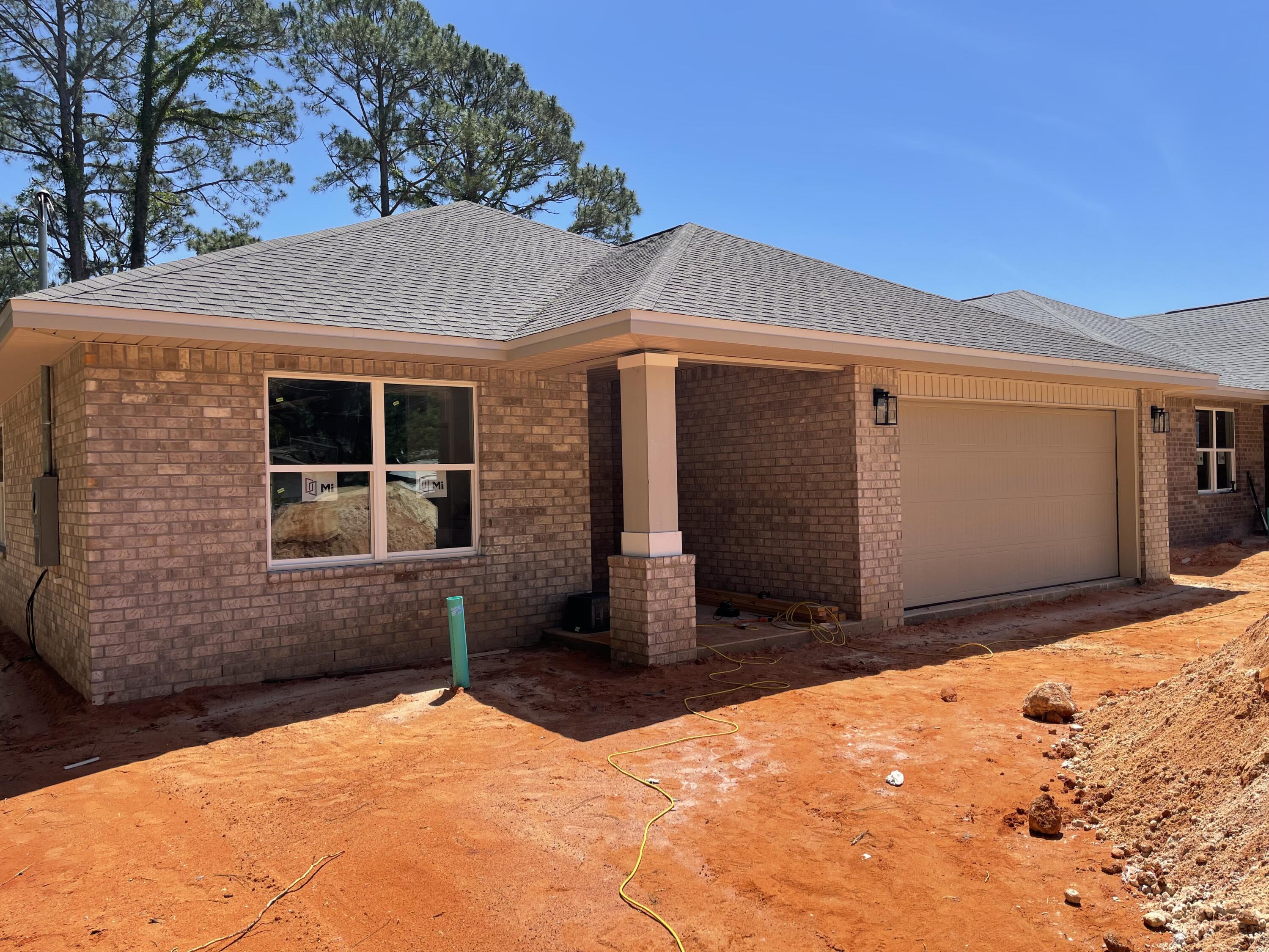 BRAND NEW 2023 ALL BRICK HOME NESTLED ON PEACEFUL END OF STREET LOT SURROUNDED BY OTHER NEW 2023 HOMES! Upon entry thru a deco top glass front door you are welcomed into a expansive living & dining space accented w/crown molding, recessed ceiling & tasteful lighting throughout.  The KITCHEN is located in a cozy front of home corner & is topped off w/huge Sunny window! It boasts QUARTZ counters, large sink, White shaker style cabinets w/soft close drawers w/ ''coffee'' area counter cabinet, Stainless appliances, smooth cook top range, Built in Microwave, Long/Large eat up bar & Corner pantry. MASTER BATH - QUARTZ counters, dual sink, Large shower w/glass door & wide sitting bench. Walk-in closet with shelf nook. MASTER BR: Ceiling fan, puck LED lights, recessed ceiling w/crown. PLUS:
