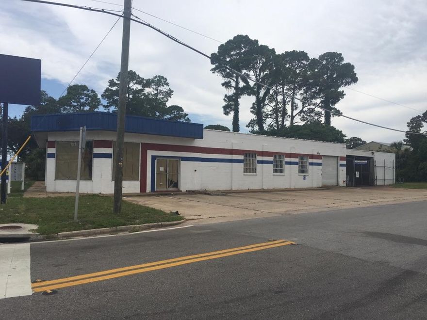 10,000 SQFT retail space on busy Eglin Parkway. One roll up door and store front windows in place.