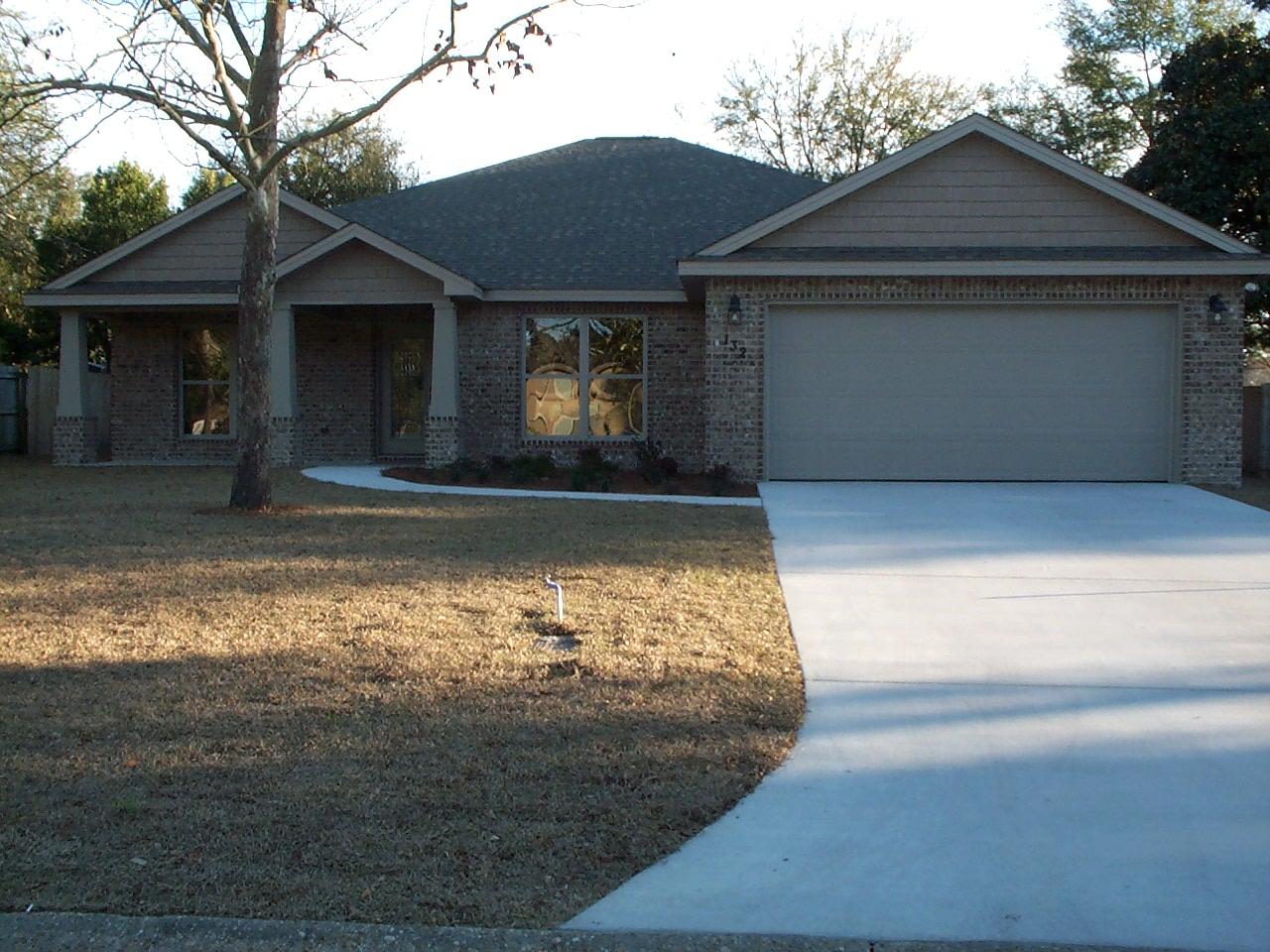 Brand New - Ready For YOU! ... All brick. One story. Large lot. Convenient to Everything. Large Front Porch welcomes guests. Hardwood Flooring in DR. Kitchen has granite, recessed lighting, SS appliances, & a raised snack bar facing LR .. Big LR: 9' ceiling, arched doorways, 20'' square tile flooring & French doors leading to to the Fam. Rm.. Family Room has a 1/2 bath. Fam. Rm. is optional 4th BR. Ext. door of Fam. Rm leads to a very large Rear Porch. Master Suite has a trayed ceiling. Lovely Master Bath has granite tops, double vanity, separate shower from tub, & extra lrg walk-in closet. BR 2 & 3 at opposite end of home for privacy separated by a full bath for convenience. (click More)