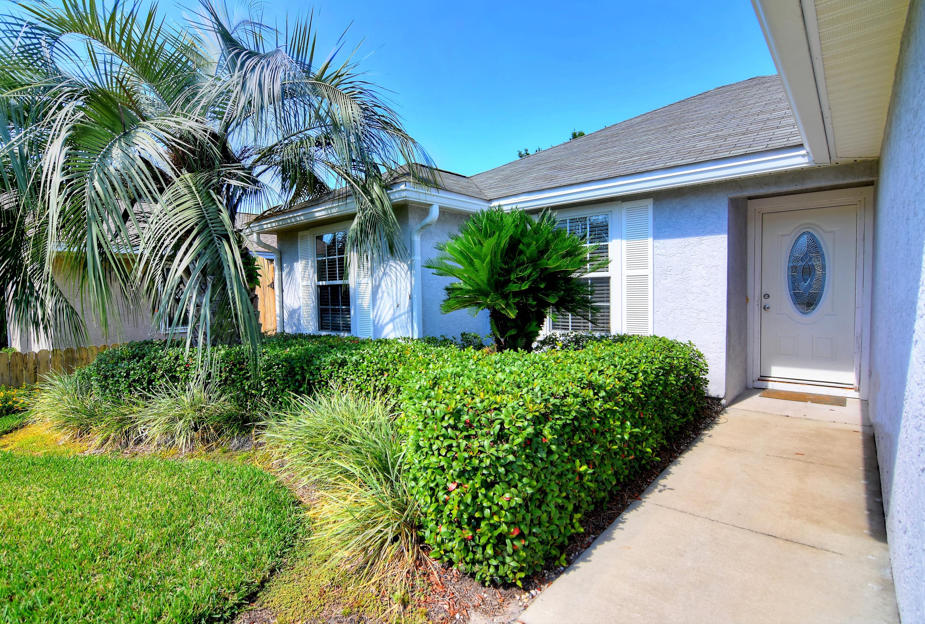 Cute stucco home in Open Sands neighborhood. Only about two blocks from the beach. Lots of new construction in the neighborhood and values are increasing! 3 BR's, 2 baths plus bonus room where seller enclosed garage to give a total of 1,530 sq ft. Seller kept garage door rails and other parts so new owner can easily convert back to a garage if they choose. High vaulted ceilings and lots of natural light make this home seem even bigger than it is. Large patio in back and big 50x130 lot with nice yard building for extra storage. Convenient location close to beach and about 1.5 miles to Pier Park. Make an appt. to see this one.