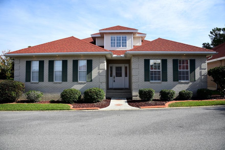 This Custom Built Home located in Magnolia Plantation located on a Corner Lot is a Must See!! Features All Brick & Professionally Landscaped. Patio has Brick Pavers. Stained Cement edging around shrubbery adds the finishing touches. Small Patio area with a retractable Awning has been added. Upon entering the foyer with 18' ceilings leading into 9' ceiling throughout home the Family Room Features a Corner vent less Fireplace, Custom Blinds and Laminate Wood Flooring. The Kitchen features 42'' Custom Cabinets, Stile Stone Countertops, Pantry & stainless appliances (ice maker & Jetted tub not warranted). NO SMOKING UNIT. SMALL PET CONSIDERED WITH OWNERS APPROVAL.& NON REFUNDABLE PET FEE NO CATS. Any person 18 years old or older must apply separately.