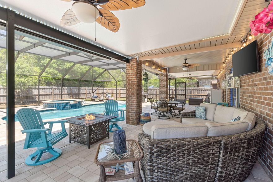 Step into style and comfort in this beautifully renovated 3-bedroom, 2-bath home featuring a sparkling pool, screened patio, and a lush backyard retreat. Recently updated from top to bottom, this home is truly move-in ready.Enjoy peace of mind with a brand-new roof, new A/C unit, and fresh paint throughout. Inside, you'll find new flooring that flows seamlessly through the home, giving every room a clean, modern look. The open-concept living area connects to a spacious kitchen, while the new cabinets in the laundry room offer extra storage and functionality.The primary suite is a relaxing escape with an en-suite bath and ample closet space. Two additional bedrooms are perfect for family, guests, or a home office.Enjoy deeded access to the sound with a long community dock. surrounded by a beautifully landscaped backyard. Enjoy morning coffee or evening relaxation in the screened porch, perfect for year-round enjoyment.

Whether you're hosting a summer BBQ, lounging poolside, or simply enjoying the peace and privacy of your backyard escape, this home has it all. Conveniently located near top schools, shopping, and diningdon't miss your chance to own this slice of paradise!