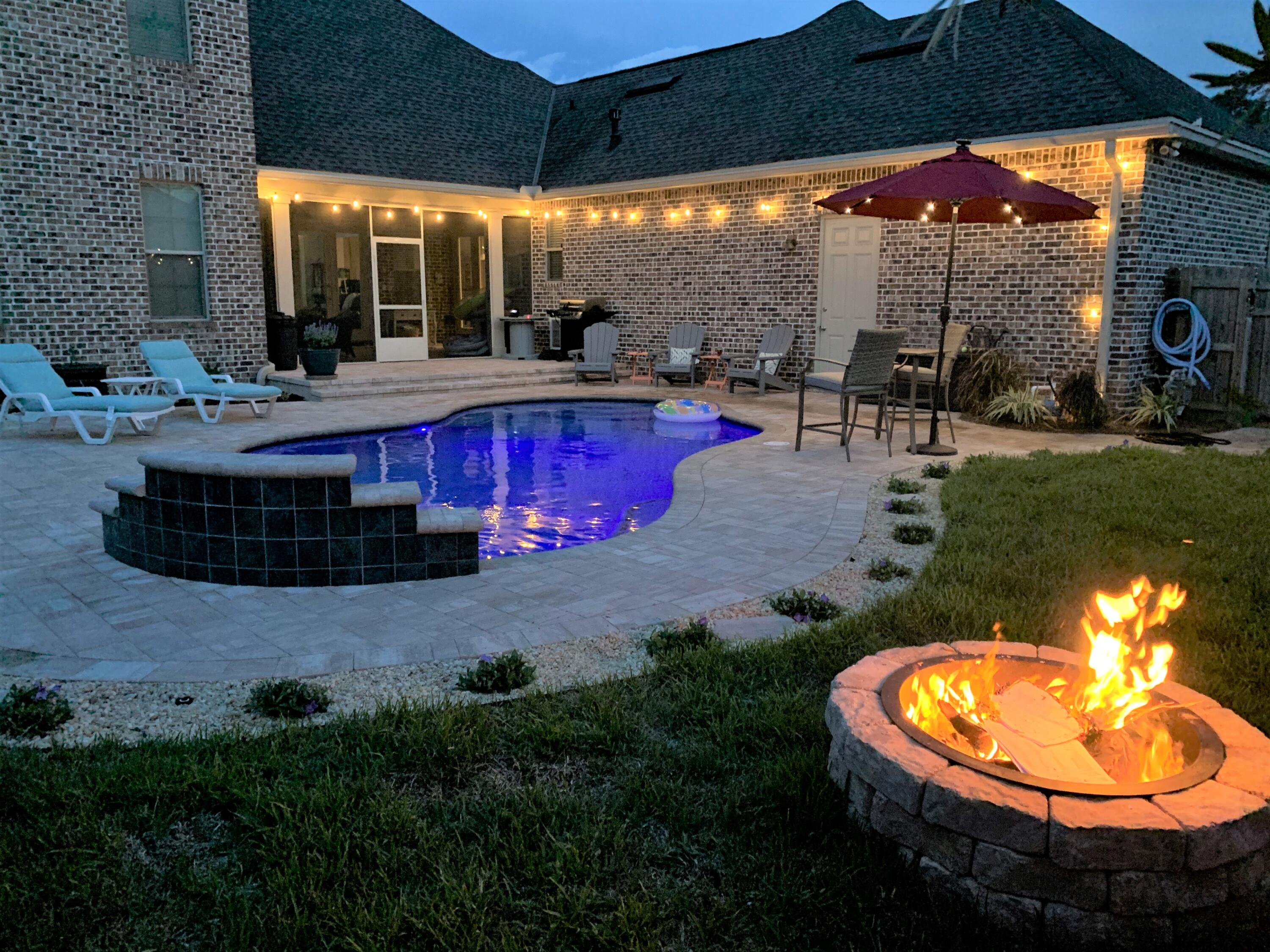 Gorgeous like-new POOL HOME in the highly sought after neighborhood of The Stables at Rocky Bayou.  Home sits on a corner lot with an extended 3-car, side entry garage.  The POOL was built in 2020 and is just so beautiful/private!  The master suite is on 1st floor along with walk-in shower, tub, and VERY large master closet.  There is another bed and bath on the first floor.  Kitchen is a DREAM come true with a gas cooktop, double ovens, all Kenmore Elite appliances, pantry, and coffee bar! Living room, dining area, and kitchen flow so nicely together.  Finished porch is perfect for a den/second living area.  Upstairs there is a large bedroom with an en-suite bath and walk-in closet. There is a den on the 2nd floor also - along with a 4th bedroom/bath.  No carpet in this lovely home!