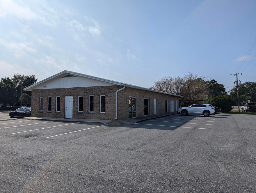 No CAM fees.This property is a versatile gem! With 3000 square feet of space, it offers a lot of potential for various business ventures. The ample floor space at the front is perfect for a shop or retail area, while the six office spaces and two bathrooms in the back provide a functional setup for professional use. The well-maintained parking lot is a great bonus, ensuring convenience for customers and employees alike.Given its previous use as a church, the building has a unique layout that could be creatively adapted for different purposes. Whether you're considering a restaurant, large-scale retail, service industry, entertainment venue, light manufacturing, repair shop, or professional offices, this property has the flexibility to accommodate a wide range of uses.