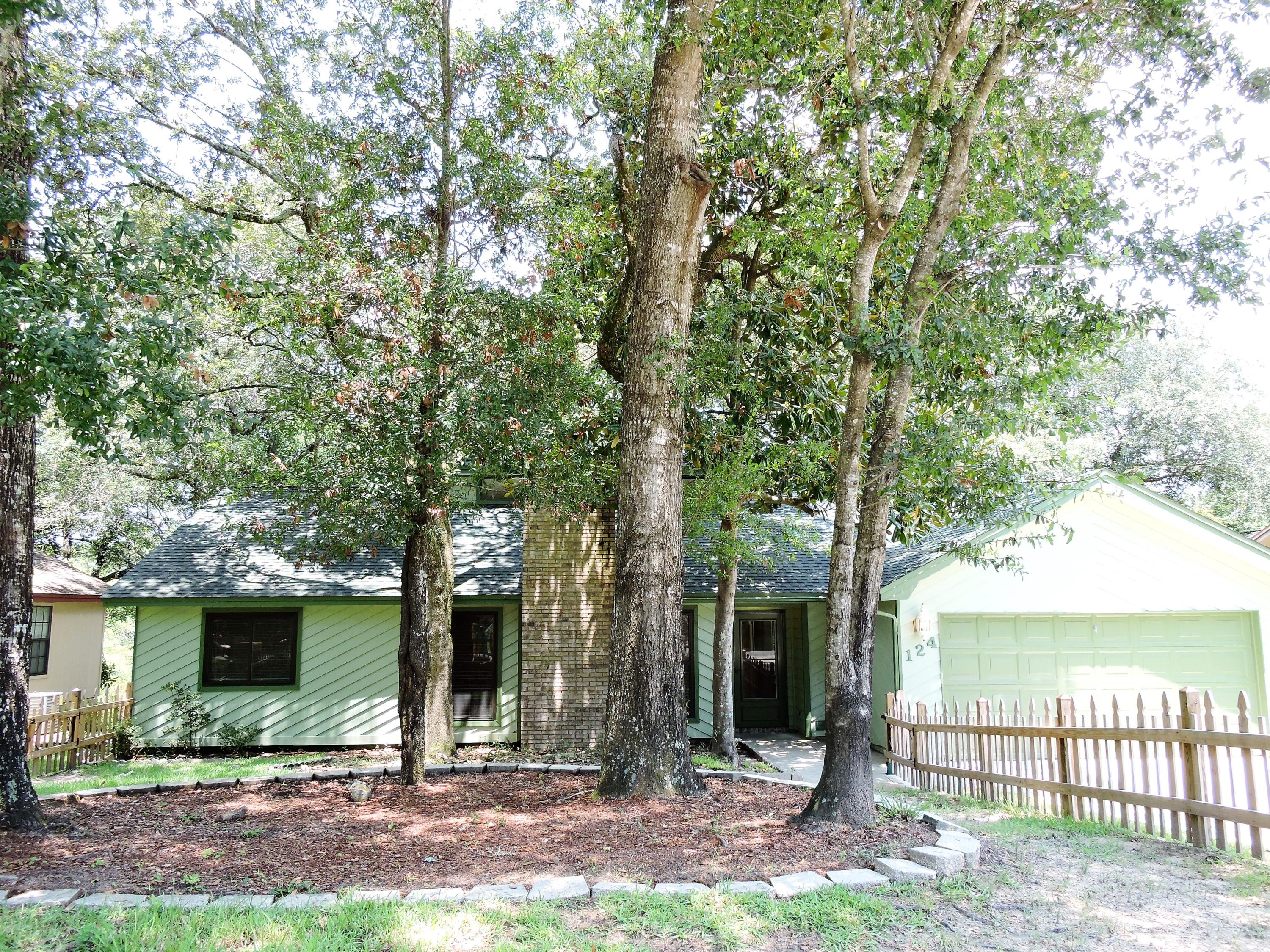 This home has an AMAZING location- extremely convenient to shopping, bases, and beaches! When you walk through the front door, you will notice the 15' vaulted family room with a gorgeous fireplace. Dining room is also vaulted and has custom chair rails. Well designed kitchen has plenty of counter space & looks out onto the super private back yard. The sunroom built w/highly energy efficient panels & is comfortable year round. Master bedroom suite is large w/walk-in closet and an updated master bath. Two more beds & another bath on the opposite side of the home. July 2016, NEW Carpet & NEW Paint(Interior/Exterior)! Super energy efficient home will save you money -Windows replaced in 2011, Rinnai tankless water heater 2010,&sep meter for your irrigation water. Roof is 2011, HVAC 2006