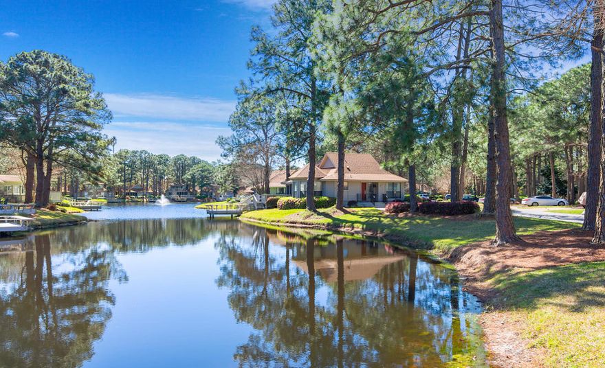 You will not find better views in The Fairways of Sandestin! This quaint two bedroom fully furnished cottage sits on a large corner lot overlooking Eagle Lake with a two-tiered deck right on the lake. Relax and enjoy the spectacular views from the living room, dining room, kitchen and master bedroom. You also have a view of the bay and golf course from the kitchen, dining room and guest bedroom. New carpet just installed in the bedrooms and tile throughout rest of home. Sliding glass doors open up to a spacious screened in porch for expansion of entertaining. Driveway pavers were installed in 2018. New refrigerator in 2018 and new stove/range in 2017. This home would be ideal for a second home or a rental investment. It is rental ready and can sleep up to six. Buyer to verify dimensions.