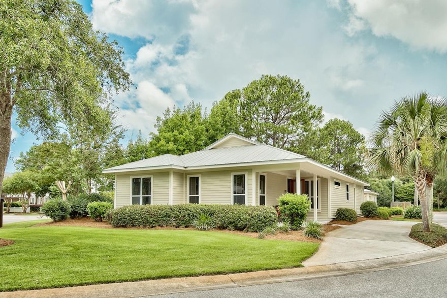 ALL ON ONE LEVEL! This beautiful four bedroom Florida Cottage is located on a cul-de-sac with a circle driveway and a much-coveted garage, just perfect for your six seat golf cart that conveys with the property. The home features an open concept kitchen/dining/living areas with a breakfast area and a dining area that are perfect for the large family or entertaining. No one feels left out when there are two master bedrooms with en suite baths.