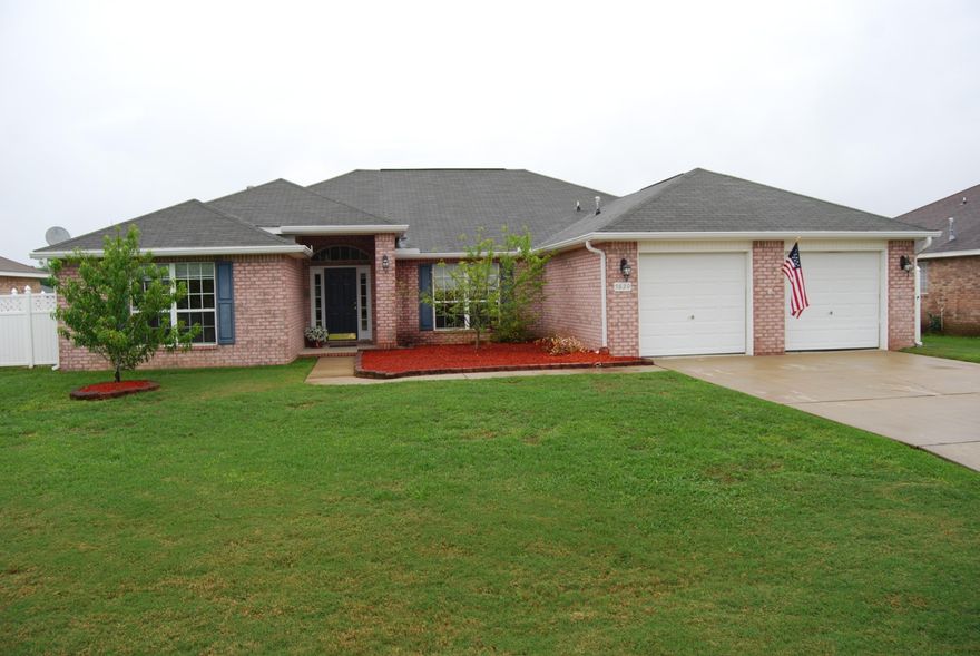 PICTURE PERFECT INSIDE AND OUT! VERY OPEN FLOOR PLAN FEATURING A LARGE KITCHEN W/NEW GRANITE COUNTERS AND STAINLESS STEEL APPLIANCES,FORMAL DINING AREA,SPLIT BEDROOMS,LARGE MASTER SUITE AND BATH WITH A GARDEN TUB AND SEPERATE SHOWER PLUS DOUBLE VANITIES.INSIDE UTILITY ROOM INCLUDES WASHER & DRYER PLUS AN EXTRA REFRIGERATOR.NEW LAMINATE FLOORING THROUGHOUT THE GREAT ROOM AND DINING AREA,TILE IN THE KITCHEN & BATHS,CARPET IN BEDROOMS.GREAT LANDSCAPING,PRIVACY FENCED BACKYARD,YARD STORAGE SHED,OPEN PATIO,SPRINKLER SYSTEM,PLANTING BEDS FOR GROWING YOUR OWN VEGTABLES,MANY FRUIT TREEES,LARGE TWO CAR GARAGE,A COMMUNITY SWIMMING POOL AND TENNIS COURTS.