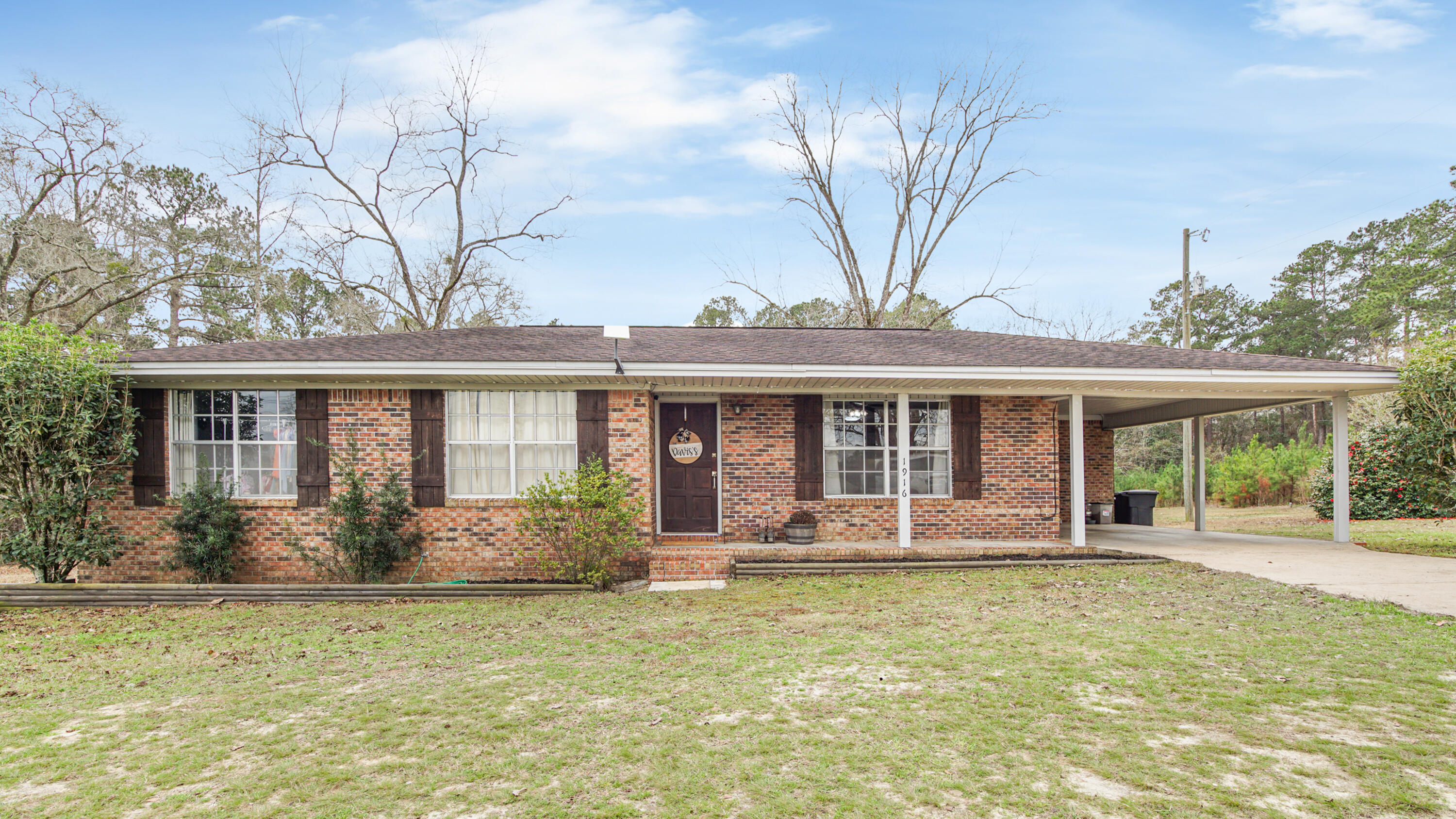 This charming 3 bedroom/ 2 bath brick home sits on a beautiful spacious one-acre. The bedrooms are spacious with ample closet space and storage galore. The open concept kitchen, dining and living room will be perfect for entertaining with room enough for everyone. The home has been well kept, tastefully updated with new paint, vinyl flooring and new HVAC in 2022. Centrally located, Panama City Beach is approximately 55 miles, Interstate 1-10 is approximately 8 miles and City of DeFuniak Springs approximately 18 miles. Don't miss out on this opportunity to own this beautiful home that is priced to sell. You won't be disappointed.