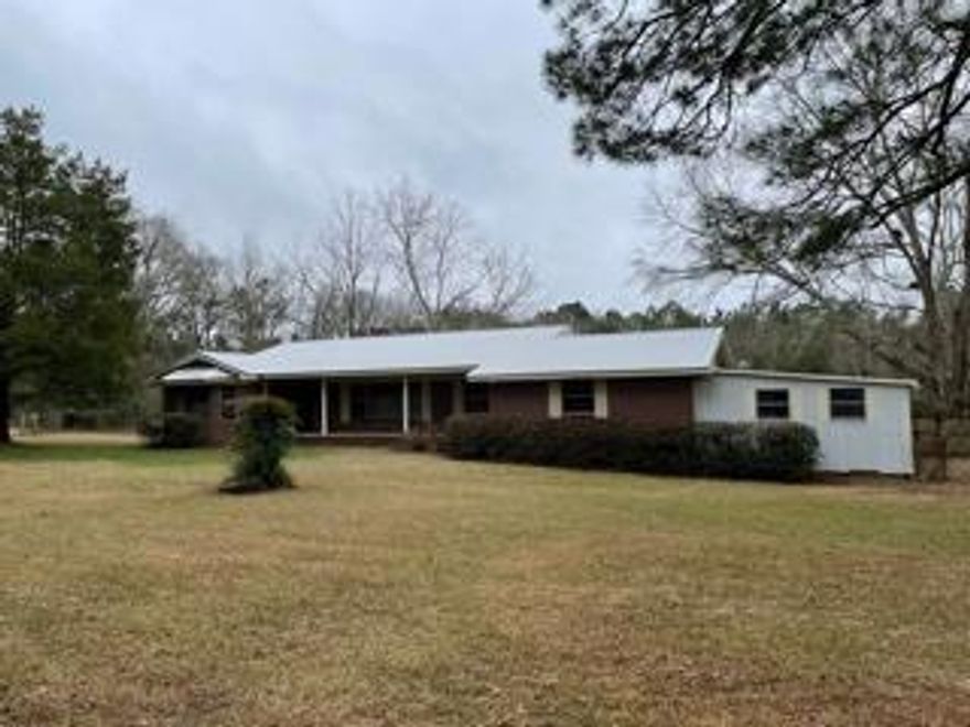 LOCATION!!!! HARD TO FIND HOME ON 3+/- BEAUTIFUL ACRES WITH LARGE TREES AND FENCED YARD.  POSSIBILITIES ARE ENDLESS WITH THIS HOME AND ITS READY FOR ITS NEW OWNERS.  CALL TODAY FOR SHOWING!