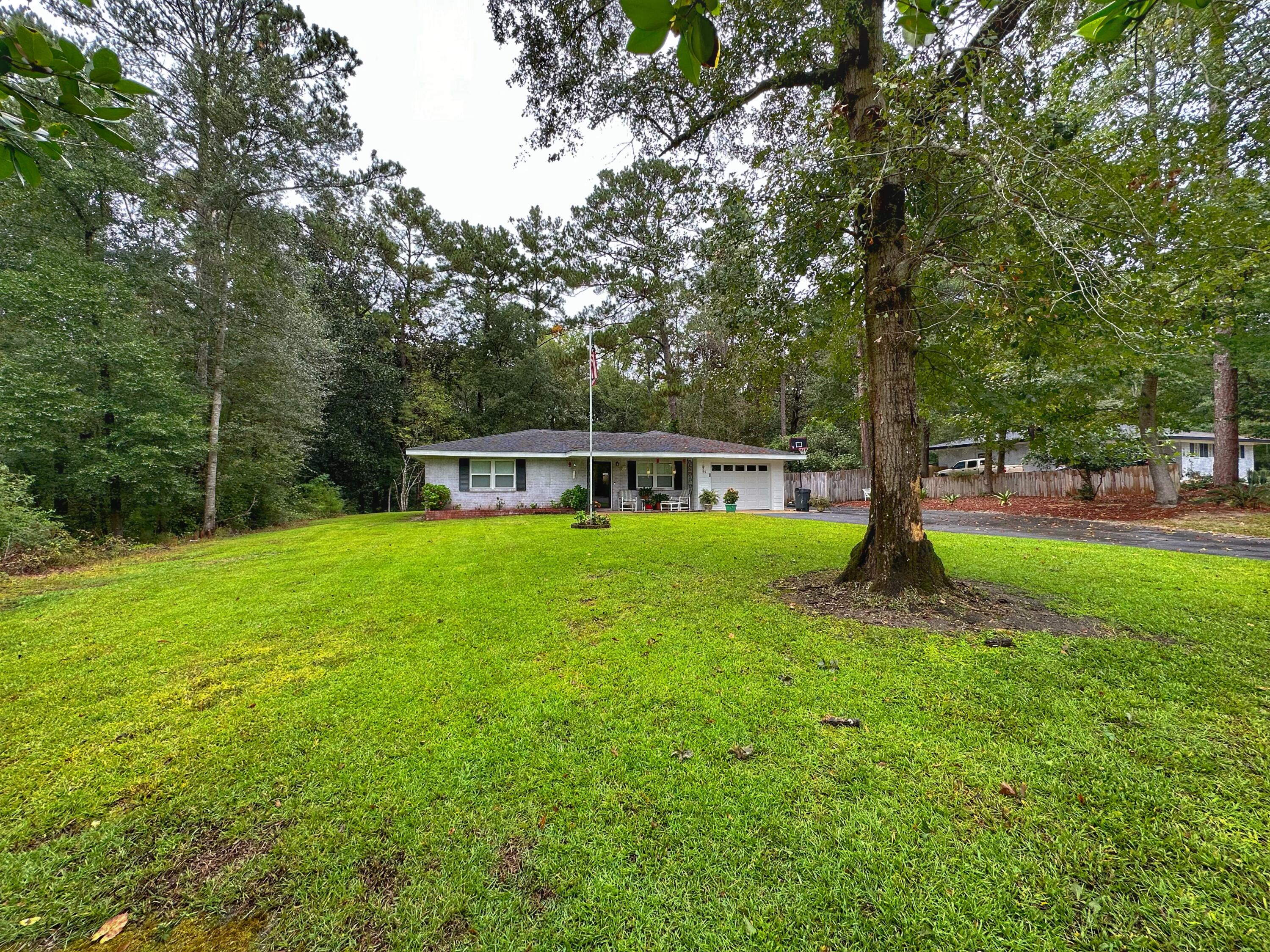 GREAT LOCATION!!! Located within a mile of shopping, dining & I-10. This 1736 sq ft white wash brick home features an open floor plan. The eat-in-kitchen has beautiful granite countertops, stainless steel appliances and a tile backsplash. The roof, septic and A/C were replaced in 2015. Carport has been closed in and made into a garage. This home is a must see! Call today for your private showing!