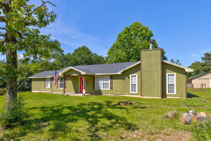 **Upgraded floors throughout**If your looking for a charming country setting that's 10 minutes from town, this SPACIOUS 4 bedroom 2 bath home, ranch-style property (with a Massive 60x40 workshop/pole barn with work benches, power and a BONUS building that has power and has been sheet rocked, painted and finished. The property includes water connections from front to back, so bring your horses, chickens, goats, pigs etc...and watch the BREATH TAKING SUNSETS behind the Split Oak tree out back. A NEW 4 ton Thermocool HVAC system (including) heat pump, air handler, all copper tubing, and 410A gas) was installed in 2014 along with a New 50 gallon water heater. A NEW grinder pump for the septic was installed in 2019 along with a NEW front door, new interior