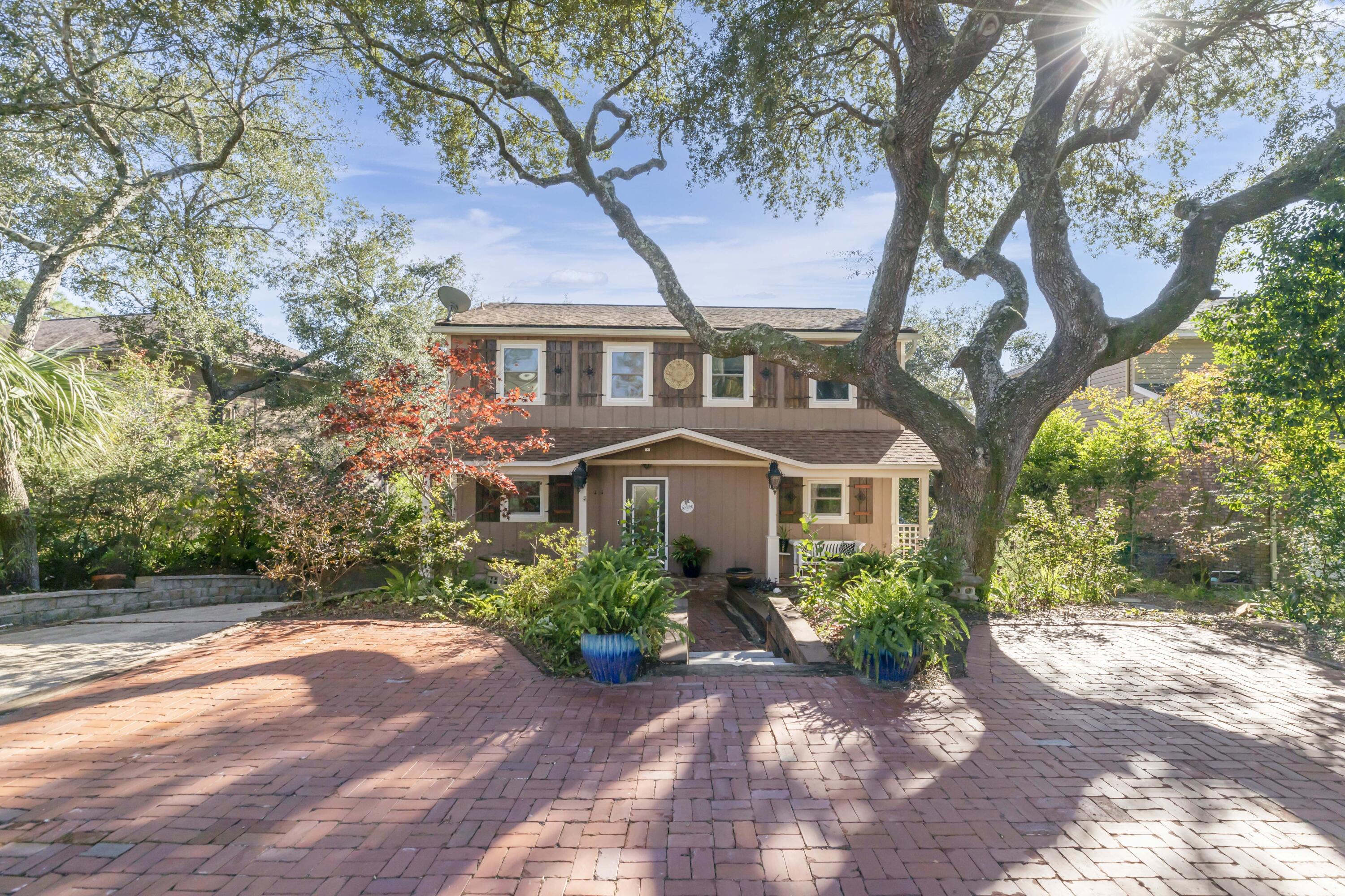 Short term rentals allowed.  This lovely home has been featured on HGTV's 'My Lottery Dream Home'. Boater's & Nature Lover's Paradise in this New Orleans inspired waterfront home, nestled on the highly coveted Sarah Ann Bayou. This property boasts a protected deep-water bayou with access to the bay, making it a haven for boating enthusiasts and wildlife admirers. The family room shines with a cathedral ceiling and a cozy gas fireplace. Glass doors leading to the upper deck, seamlessly merge indoor and outdoor living. The upper deck, overlooking the serene bayou, is your personal retreat, perfect for sipping your morning coffee while watching the sunrise or enjoying a glass of wine as the sun sets.This tranquil space allows you to fully unwind and appreciate the care and attention that
has been poured into this home.
This home has been meticulously updated, featuring high-energy-efficient hurricane-rated windows and doors, a tankless gas hot water heater, granite countertops, and upper and lower decks rebuilt with fiberglass-reinforced composite decking. The primary bath and laundry room have been thoughtfully upgraded with new cabinets, granite counters, and modern plumbing fixtures.

Boating enthusiasts will adore the dock, equipped with a 16K boat lift, water, lighting, electric, and shore power. 2 additional boat slips provide ample space for all your watercraft or potential to rent to a friend. The dock, like the decks, is crafted with fiberglass-reinforced composite decking for durability and beauty.

The second-floor features two bedrooms, a full bathroom, loft space, and a convenient storage closet off the hall, providing comfortable and versatile living options.

The oversized garage/workshop is heated and cooled. Not to mention it has its own water view! (The square footage of this heated & cooled space is NOT included in the 2508)
Seller is willing to replace the roof with an acceptable offer.  The seller's lender does not require flood insurance. 
Seller has a VA mortgage at 2.375% and is willing to allow an assumption by a buyer who is able and willing to substitute their eligibility.

This waterfront oasis on Sarah Ann Bayou is more than a home; it's a lifestyle. Don't miss the chance to make it your own and experience the beauty and serenity that this unique property offers.

Buyer to verify anything deemed important.