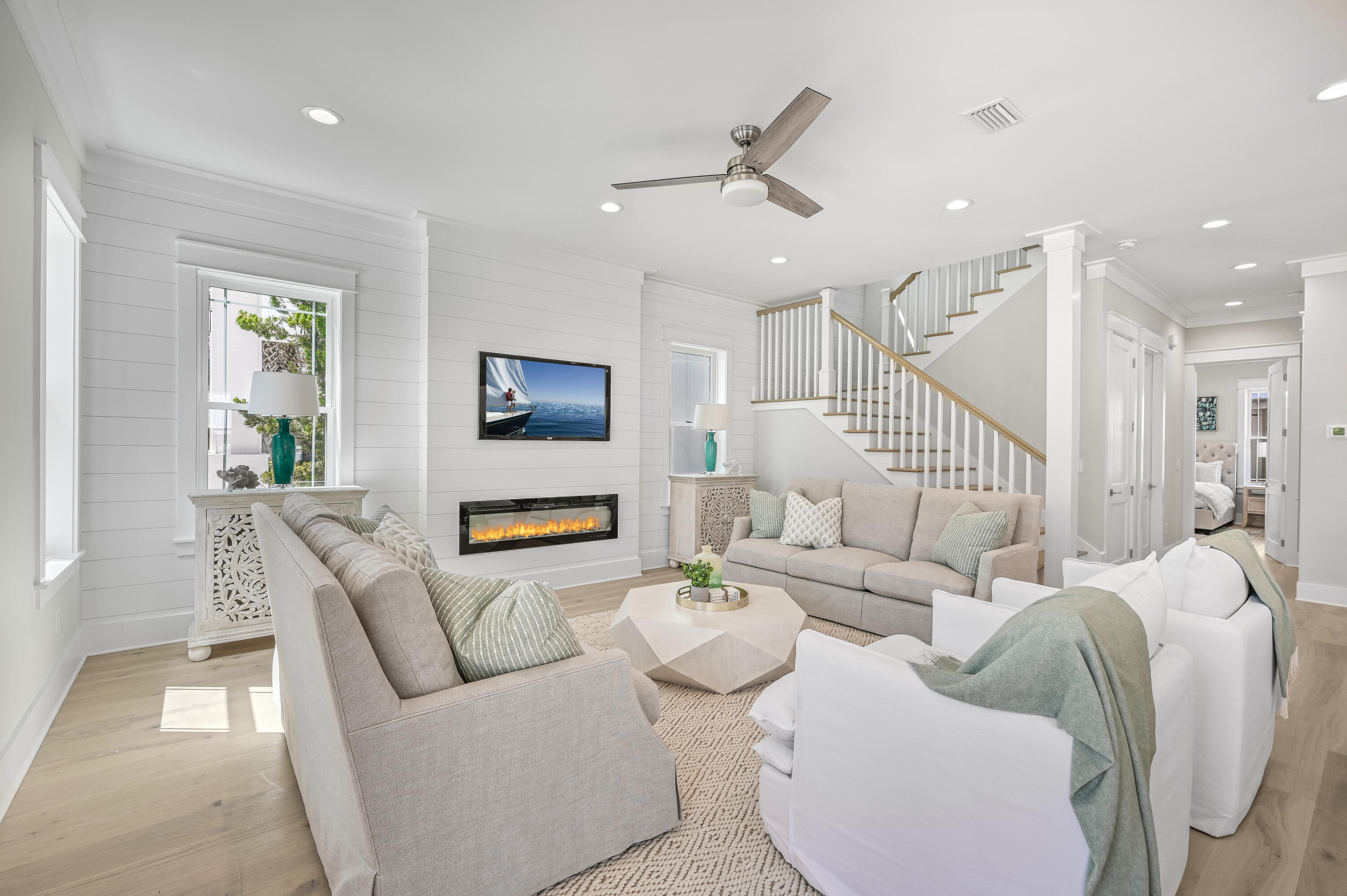 Brand new construction awaits in the coveted coastal community of Seacrest, ideally positioned between Alys and Rosemary Beaches along Scenic Highway 30A. Boasting nearly 3,000 square feet of living space, five bedrooms and four-and-a-half baths spread over two stories, this fully-furnished home is ideal for large groups or rental investment. Recently completed in 2023, this home offers high-end finishes, owner's suite on the first floor, two living areas and abundant natural light in an open-concept design. The second floor provides three bedrooms and a bunk room with access to a second-story porch ideal for relaxing after a day in the sun. This home offers convenient access to a large lagoon pool and beach access as well as tram service to the beach and close walk to restaurants and