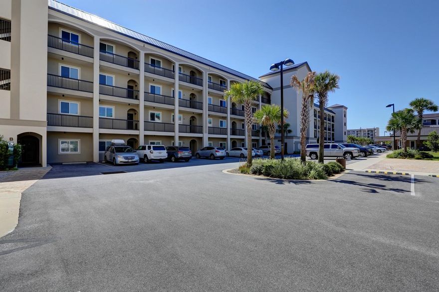 GREAT NEW PRICE! A short walk across street to YOUR toes in sand! SEE VIDEO: https://vimeo.com/230156976 Feast your eyes on morning SUNRISES over the Emerald Coast in this TOP floor luxury condo. Experience the Gulf's white sand and clear water in B403 by simply walking across the street. Perfect for dining in, as there is a full kitchen equipped with granite countertops, stainless steel appliances, oversized pantry, and stack washer/dryer in hallway. A large high-top table by the window provides you with enjoyable views. Every room has a 58 Smart TV and is beautifully decorated with a beach theme including hardwood floors. Amenities include a pool, hot tub, children's splash pad and a grilling area. As a rental it can occupy 10 comfortably, but is also a great place to call home.