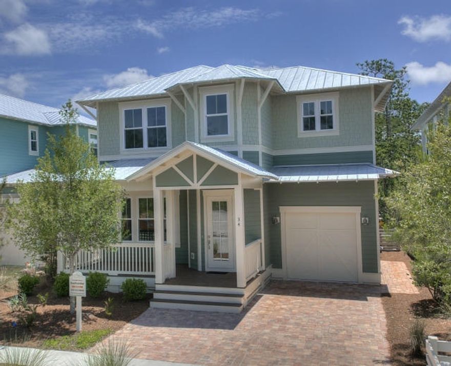 New, high-quality construction homes in NatureWalk, nestled between protected borders of the state forest, adjacent to WaterColor, Seaside, and the heart of 30A. This Beachcomber home offers 2 stories, 2382 square feet, 3 bedrooms, 3 baths, day room, 1 car garage and owner's lock out. Features include: wood flooring throughout, granite, Cafe stainless steel appliances, upgraded cabinets and spacious porches. Gorgeous island in kitchen with built in cases and wine racks. This home has upgraded elevation with double, spacious porches. The Gathering Place, the community's amenity center includes: a resort-style beach entry pool, heated lap pool, children's pool, tot lot, hammocks, multiple entertainment areas including a fire-pit, grills and seasonal BEACH SHUTTLE!