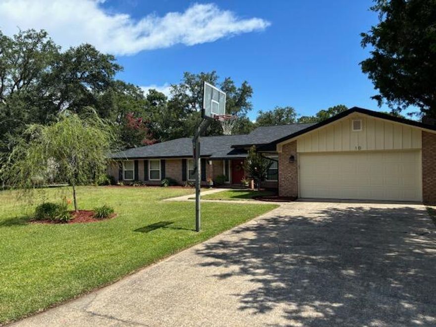 Welcome to this beautiful home in Poquito Bayou! As you enter, you are greeted by a hallway leading into a spacious great room with large windows overlooking the backyard and a stunning fireplace. The office features floor-to-ceiling built-in bookcases, providing ample space for book lovers. The dining area, with its bay window, offers a lovely view of the expansive yard and pool. The kitchen, equipped with abundant cabinet space and all appliances included, is both comfortable and convenient to the dining area.This home features 5 bedrooms, several of which have custom bookcases and dressers, adding a unique charm. The large primary bedroom comes with an ensuite bathroom. The garage has ample space for two vehicles, along with additional room for storage and hobbies.Outside, you'll find a large yard and a pool, perfect for outdoor enjoyment. Additionally, there is a boat slip/dock, elementary school, and a county park just a short distance from the home.
