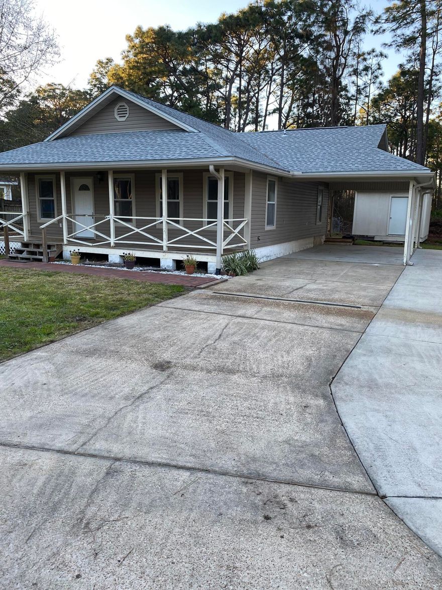 Quiet street where you can hear to the creek flowing.  Use your imagination to fix up this beautiful lot and house to make it your home.  Large lot with lots of potential.    Roof 2020; Water Heater 2021;As is; Seller to do no repairs.