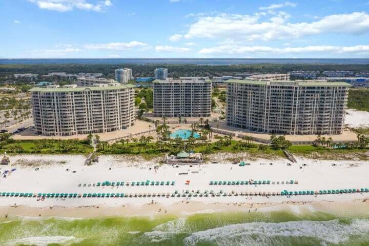 Introducing St. Kitts, the sixth and final condominium tower at Silver Shells Beach Resort. Offering a pre-construction discount for a limited time. Hurry to reserve and lock-in your units sale price! The inline C-unit was proficiently designed to showcase the extraordinary views of the Gulf of Mexico and Henderson Beach Park. St. Kitts provides a coastal lifestyle with luxury amenities, modern conveniences, and enhanced interior finishes. Square footage has upgraded by nearly 30% from previous floor plans. Remarkable features comprise of extended ceilings, granite countertops, covered terraces, outdoor kitchen option, and a luxury master bath. St. Kitts is rental restricted, provides private deeded beach access, along to the pool, gym, spa, and more. Westbury Unit Specifications
* 3 bedrooms, 3 bathrooms
* 2,590 square feet
* 240 square foot Gulf front covered southeast facing Sunrise Terrace with optional outdoor summer kitchen and gas grill
* 200 square foot covered northwest facing Sunset Terrace
* Private elevator with direct access to unit and private elevator foyer
* Open living, dining and kitchen with Gulf views
* Kitchen features breakfast bar, separate pantry, stainless steel appliances, premium grade counters and cabinets
* Full-size laundry room with storage and sink
* Gulf front master suite has direct terrace access and features two walk-in closets, large en-suite bathroom, separate tile shower with seat, soaking tub, double vanities, premium counters
* Guest bedroom has direct terrace access, walk-in closet and en-suite bathroom
* Second guest bedroom has direct terrace access