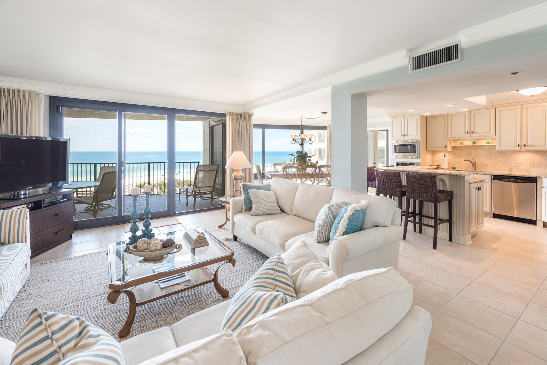 Immaculately kept 6th floor 3 bedroom, 2 bath waterfront condo with sweeping floor to ceiling beach & ocean views. Master bedroom maintains gulf views along with a private en suite balcony & spacious bathroom with dual vanities & large walk-in closet. Additional bedrooms overlook the Baytowne Golf Course and sparkling lakes of the resort. The gulf front balcony provides additional living space and light is abundant in this quieter end unit, having windows on all four sides. Home has been remodeled to include custom cabinetry in kitchen & baths, crown moulding, granite counter tops, walk-in tiled showers, SS appliances, washer + dryer, and updated HVAC system. Unit is being sold by the second owners since construction and has never been on a rental program.**Garage Space included in pric
