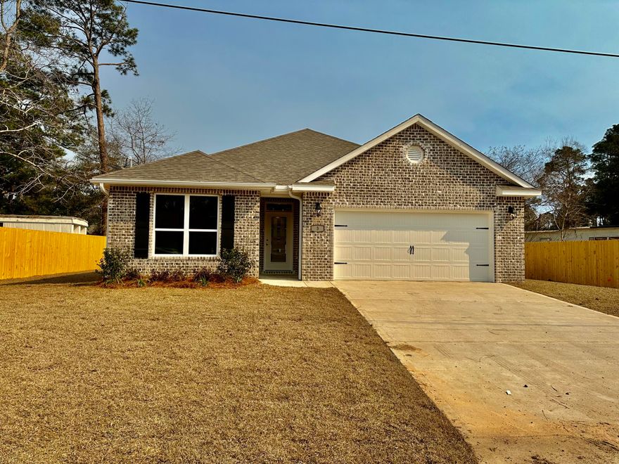 Welcome home to this beautiful brand new home centrally located to air force bases and the beautiful white sandy beaches of the Emerald Coast.  This home offers a spacious living room open to a beautiful kitchen with granite counter tops, beautiful white cabinetry.   Beautiful wood look tile flooring throughout with carpet in bedrooms.  Spacious master bedroom with tray ceilings.  There is 2 additional bedrooms as well.  Enjoy family barbecues on the beautiful lanai.  Make this fabulous home yours today.  Buyers to verify all areas of importance including lot size, room measurements any and all areas of importance.