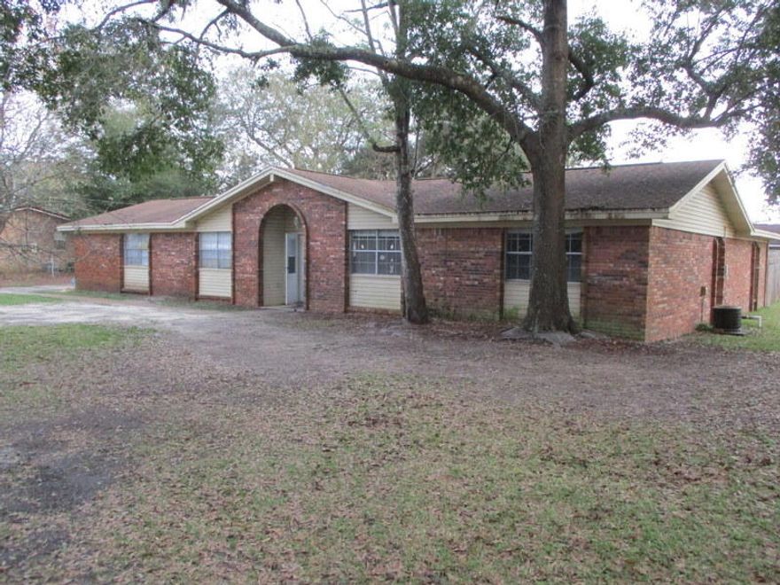 Minutes from everything in the heart of Fort Walton Beach, this REO is large, rests on a corner lot and has lots of potential. Built in 1979, this 3 bedroom 2 bath home has tiled floors, laminate and carpet in bedrooms. An open kitchen/living room space with Fireplace adds to the appeal. A corner lot home with side entry 2 car garage, this property is a must see to appreciate the potential. Call today!