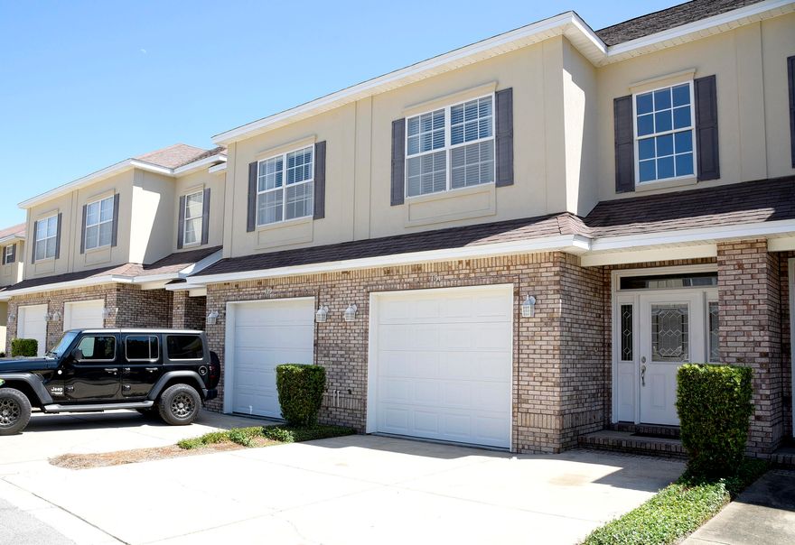 This maintenance free, three-bedroom townhome is conveniently located close to Turkey Creek with its beautiful long boardwalk winding over the large creek with informative nature and wildlife markers and swimming decks.  It is close to Eglin AFB, NWF State College, and Destin-FWB Airport.  The home features an open floor plan with a fireplace, and outdoor deck.  Home also features a brand-new A/C System and newer (2-year) stainless steel appliances.  Buyers to verify all measurements and info.