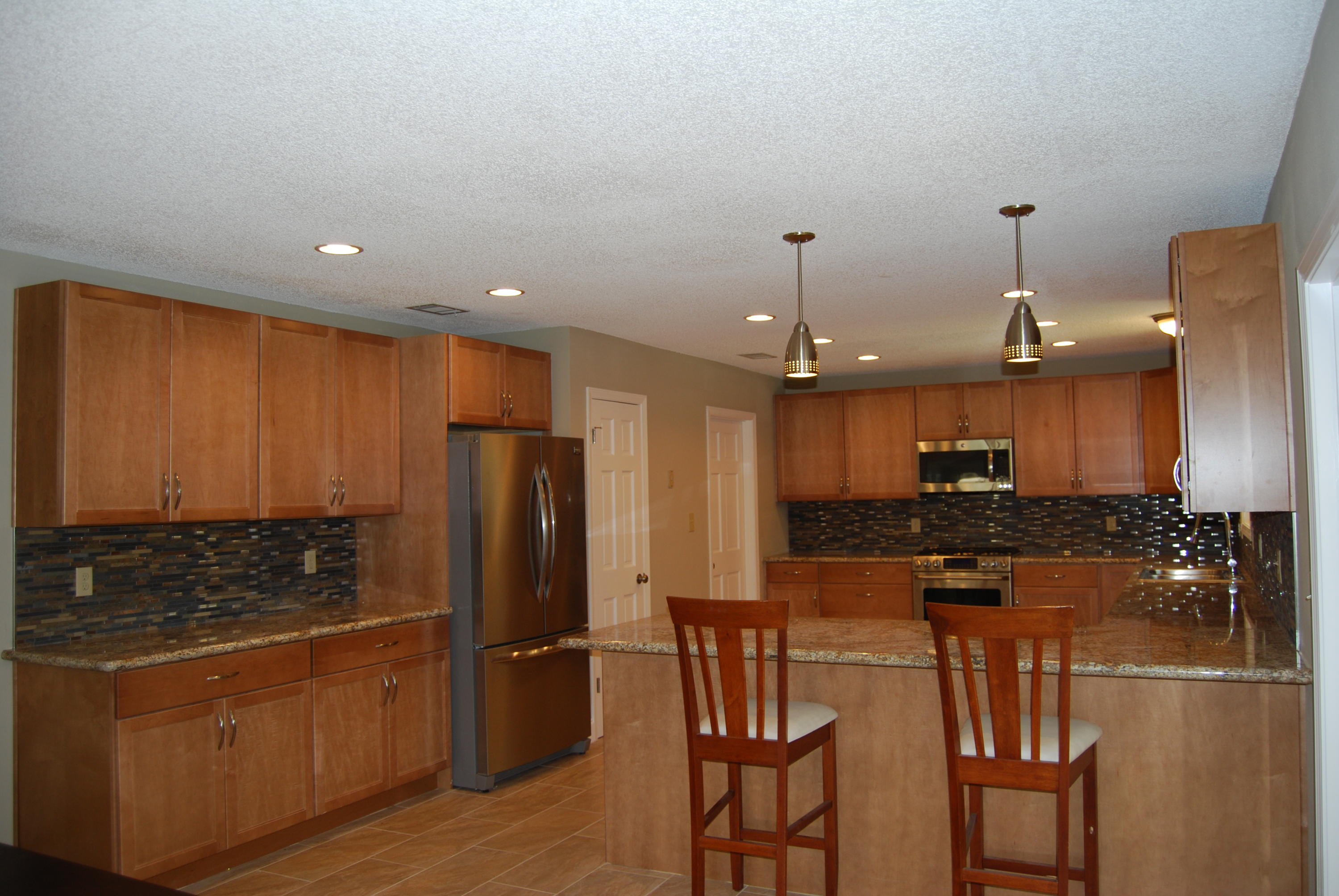 Completely remodeled house in desirable Indian Bayou neighborhood. It's a must see. Large chef's kitchen opens up to dining room and large living area. Kitchen features gas range, all stainless steel appliances, granite countertops, and breakfast bar. Master bedroom features walk in closet and master bath with air tub, separate shower and double vanity. Three additional guest bedrooms provide plenty of space along with two additional full bathrooms. One guest bathroom features a double vanity. All bathrooms have beautiful tile work. Completely resurfaced pool. Home will be ready for move in on September 1st. Landscaping still to be completed by homeowner within a few weeks.Credit and background check required. Pool service included in rent. Tenants responsible for lawn maintenance.