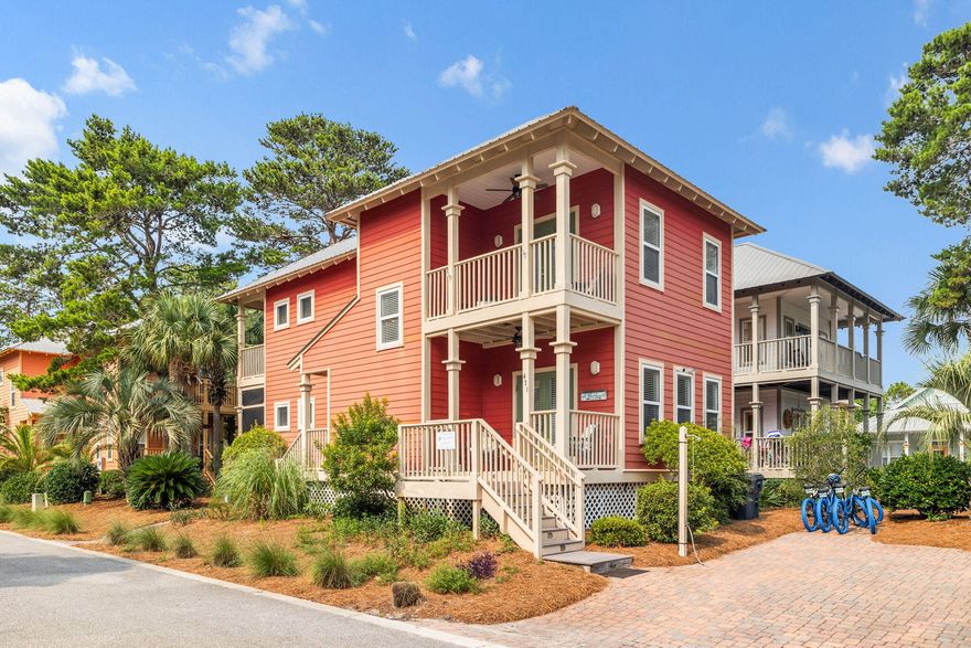 Welcome home to one of the best kept secrets along 30A - Old Florida Village! With just 75 homes nestled between palms and pools in this gated neighborhood, you'll fall in love with the colorful coastal cottages and close-knit community feel the moment you drive in. This two-story home is perfectly situated on a premium lot just steps from one of two pools and features three bedrooms, each with its own private porch. A sought-after screened porch allows for enjoying the outdoors in any weather, and the additional front porch is perfect for taking in relaxing mornings and breezy evenings. Step inside to a bright, open-concept living space designed for easy coastal living. The kitchen boasts granite countertops, stainless steel appliances, a large center island, and a wet barperfect for entertaining guests. The adjacent dining and living areas flow seamlessly, creating a welcoming atmosphere for gatherings.

The exterior boasts Hardie Plank siding, a Galvalume metal roof, and a brick paver driveway, blending durability with classic beach cottage style. Located just steps from one of the two community pools, this home also benefits from lush, manicured landscaping maintained by the HOA.

Enjoy a quick and easy walk to three public beach accesses (Gulfview Heights, Spooky Lane, and Ed Walline State Park) and explore the nearby Shops at Gulf Place, offering boutique shopping, dining, and live music. Whether you're looking for a high-performing vacation rental, a peaceful second home, or a full-time coastal retreat, this home checks all the boxes.