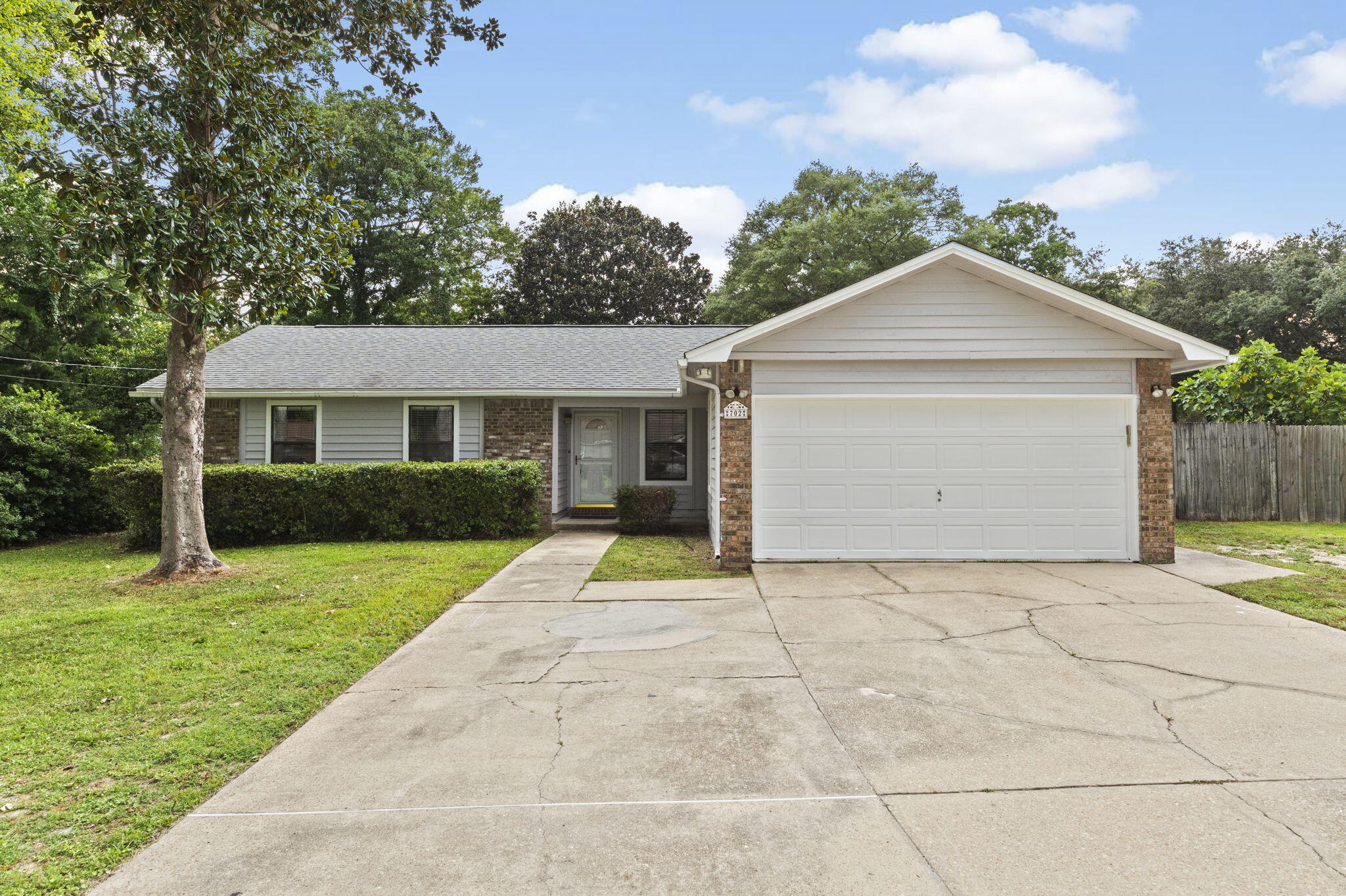 Welcome to 702 Kumquat Avenue!This charming Florida ranch-style home offers comfort, space, and convenience. Highlights include a spacious, fully fenced backyard perfect for pets or entertaining, an inviting living room with a cozy fireplace, and an enclosed, heated and cooled Florida room for year-round enjoyment. The master suite boasts an ensuite bathroom and a generous walk-in closet, providing ample storage space. Located close to military bases, top-rated A+ schools, and the stunning beaches of the Emerald Coast, this home is a perfect blend of function and Florida lifestyle.HVAC 2022- Water Heater 2021- Roof 2015.